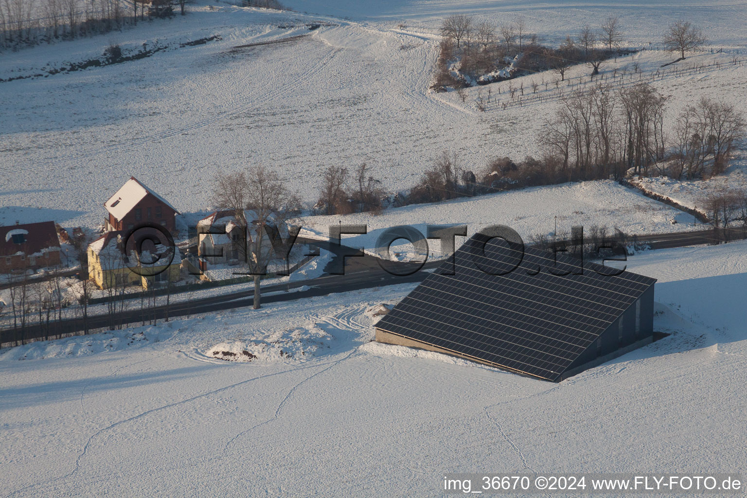 In winter when there is snow in Neewiller-près-Lauterbourg in the state Bas-Rhin, France from above