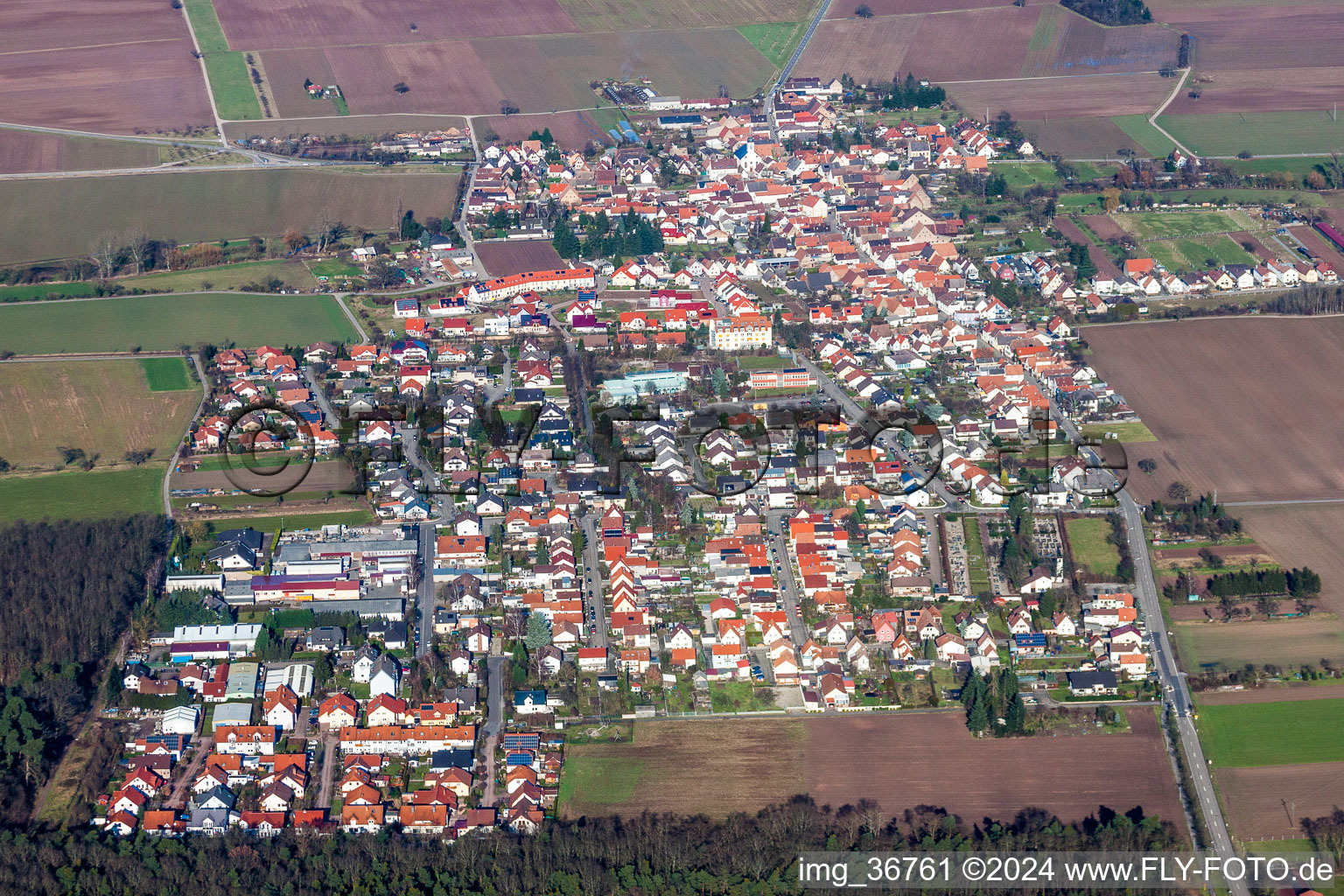 Aerial view of Village - view on the edge of agricultural fields and farmland in Westheim (Pfalz) in the state Rhineland-Palatinate, Germany