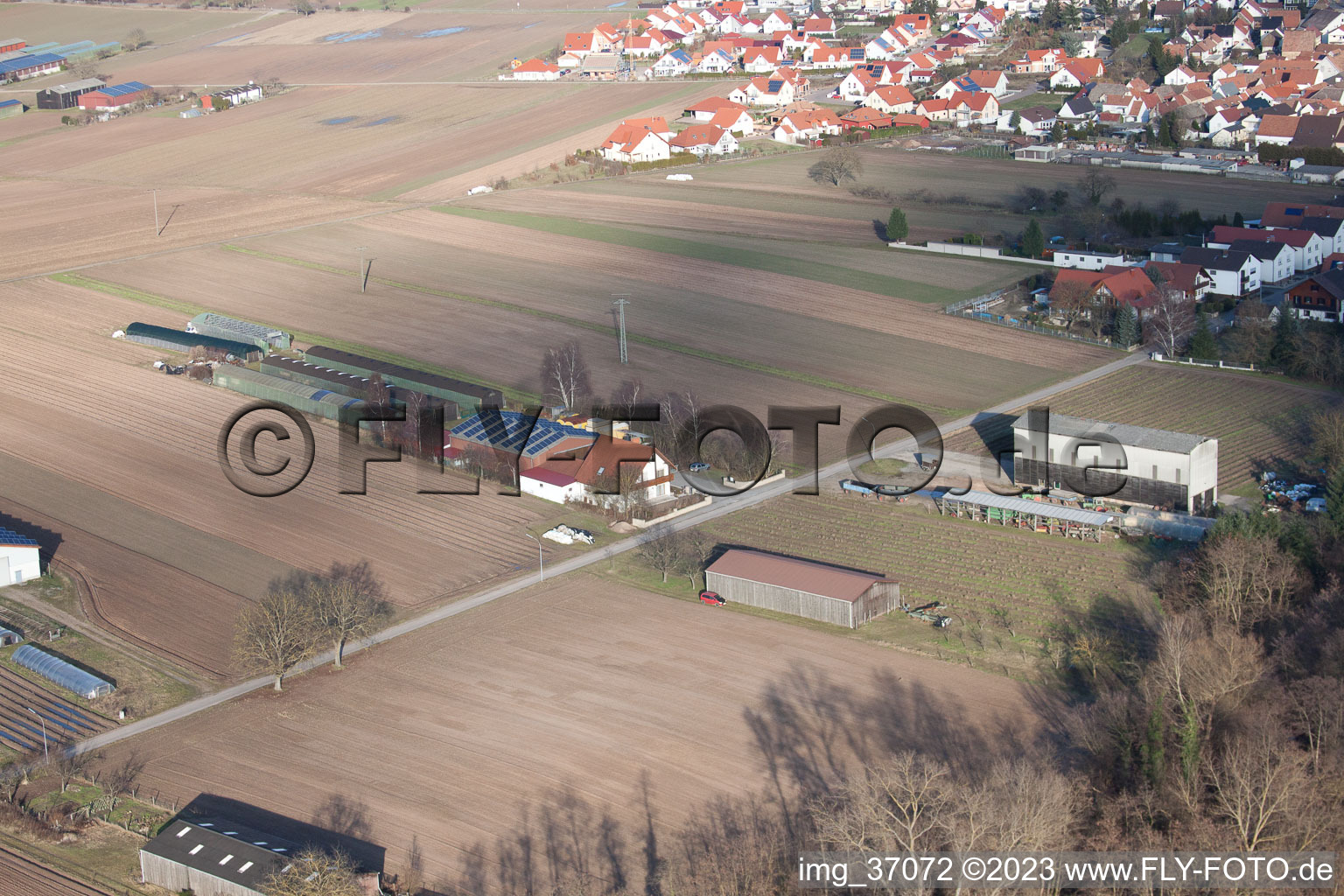 Aerial view of Settlers’ farms towards Rülzheim in Hördt in the state Rhineland-Palatinate, Germany