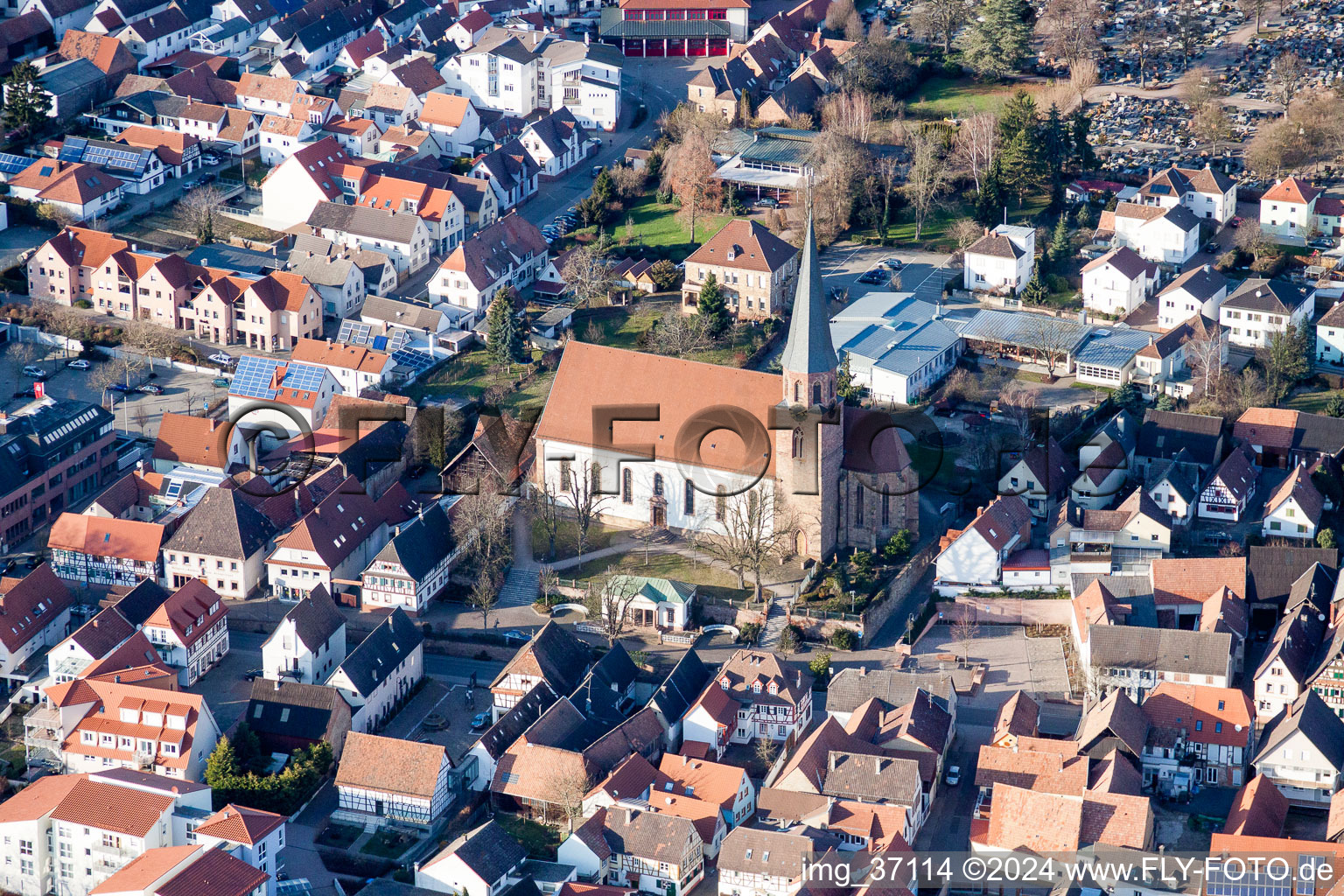 Aerial view of Church building in Kath. Kirche St. Maria Himmelfahrt Herxheim Old Town- center of downtown in Herxheim bei Landau (Pfalz) in the state Rhineland-Palatinate, Germany