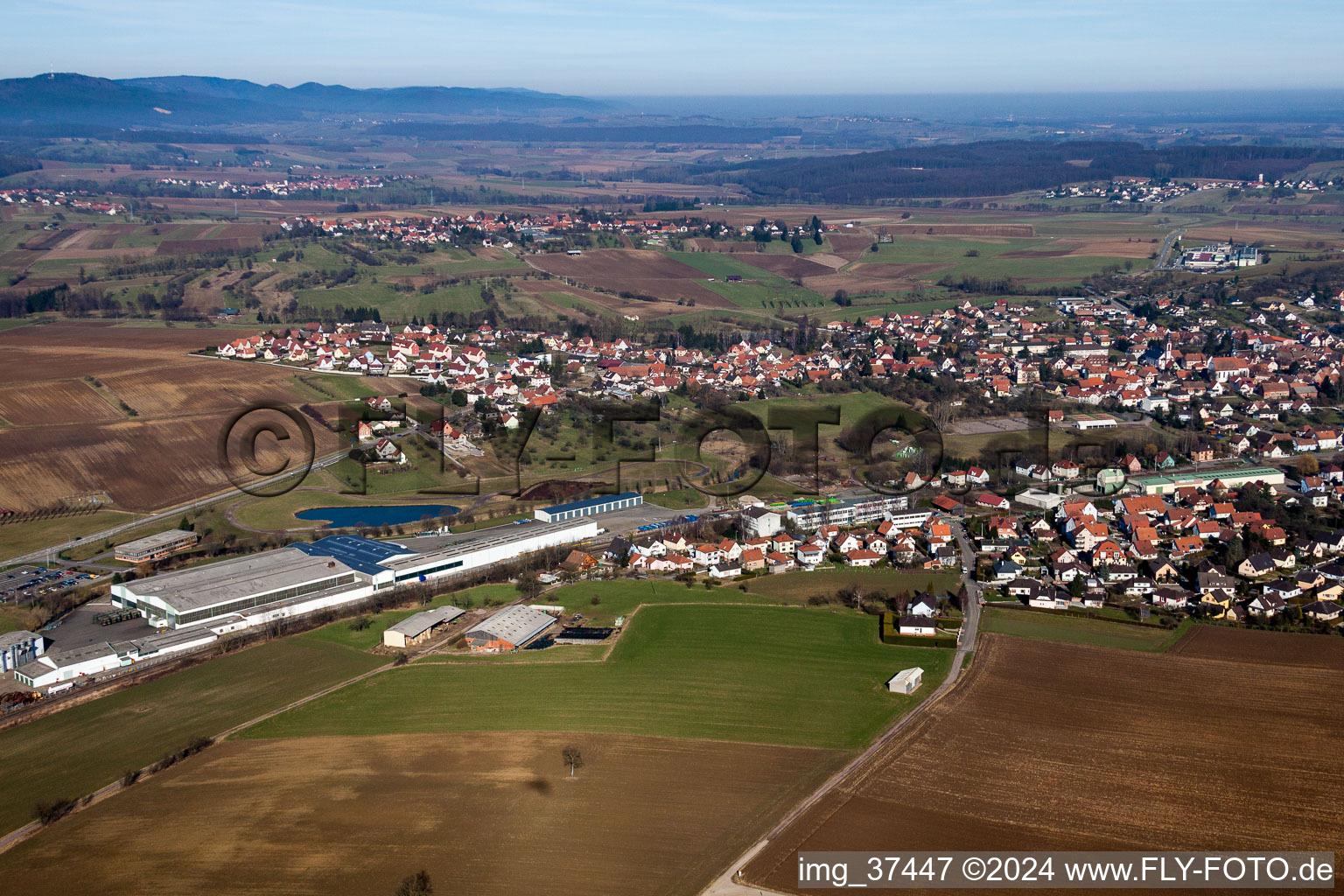 Town View of the streets and houses of the residential areas in Soultz-sous-Forets in Grand Est, France out of the air