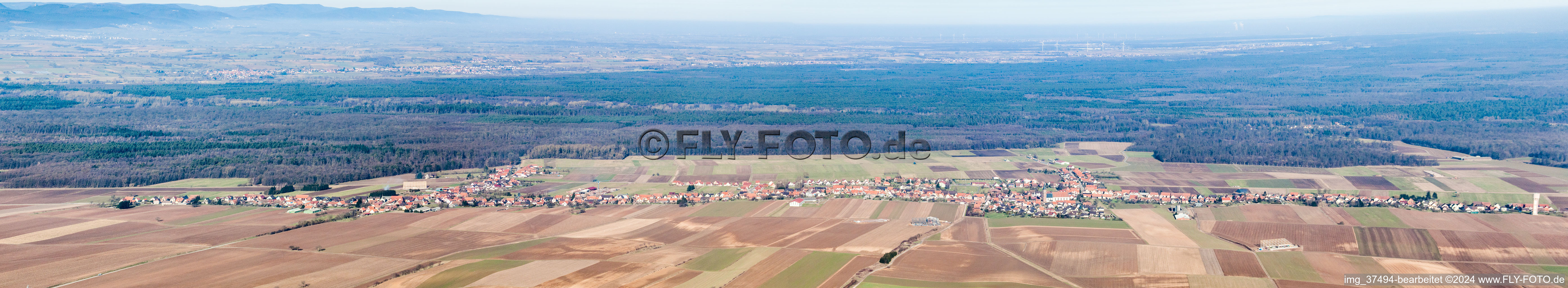 Aerial view of Panoramic perspective of the Longest Village in Alsace in Schleithal in Grand Est, France