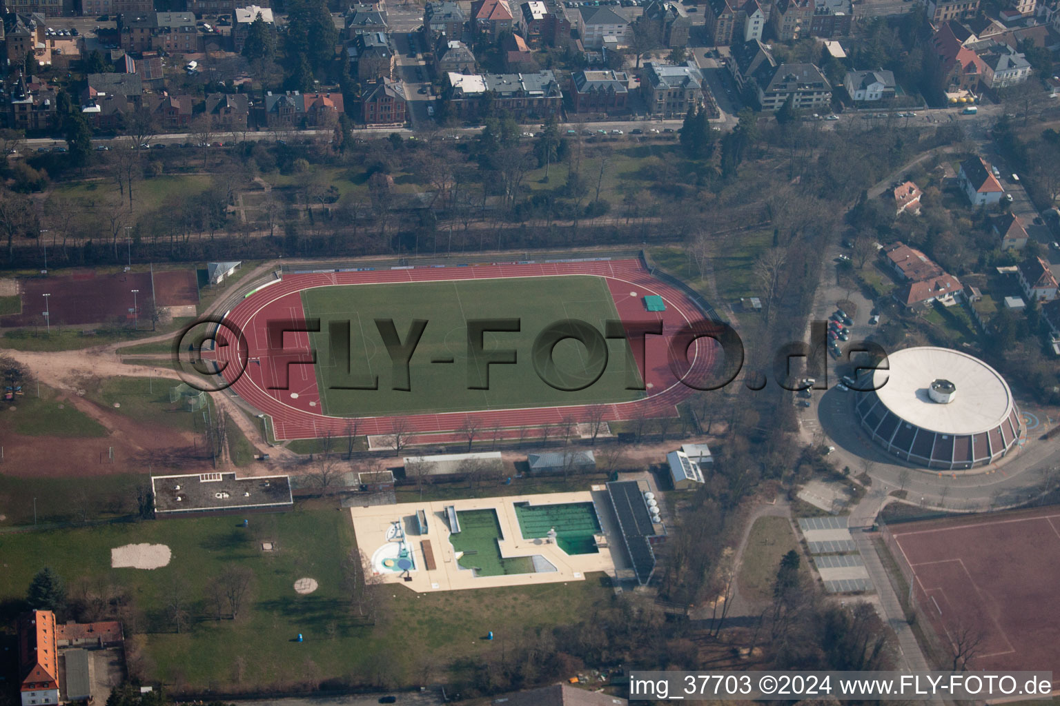 Aerial view of Round sports hall, outdoor pool in Landau in der Pfalz in the state Rhineland-Palatinate, Germany