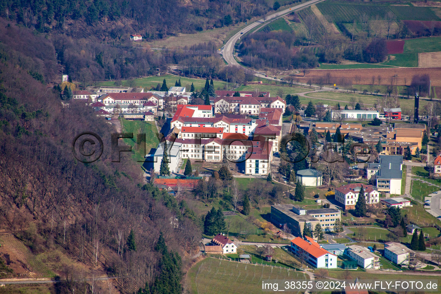 Oblique view of Hospital grounds of the Clinic Klinik fuer Kinder-/Jugendpsychiatrie and -psychotherapie in the district Pfalzklinik Landeck in Klingenmuenster in the state Rhineland-Palatinate, Germany