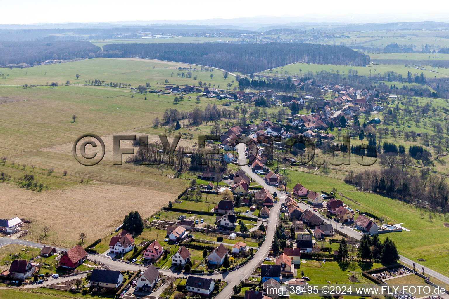 Village - view on the edge of agricultural fields and farmland in Struth in Grand Est, France