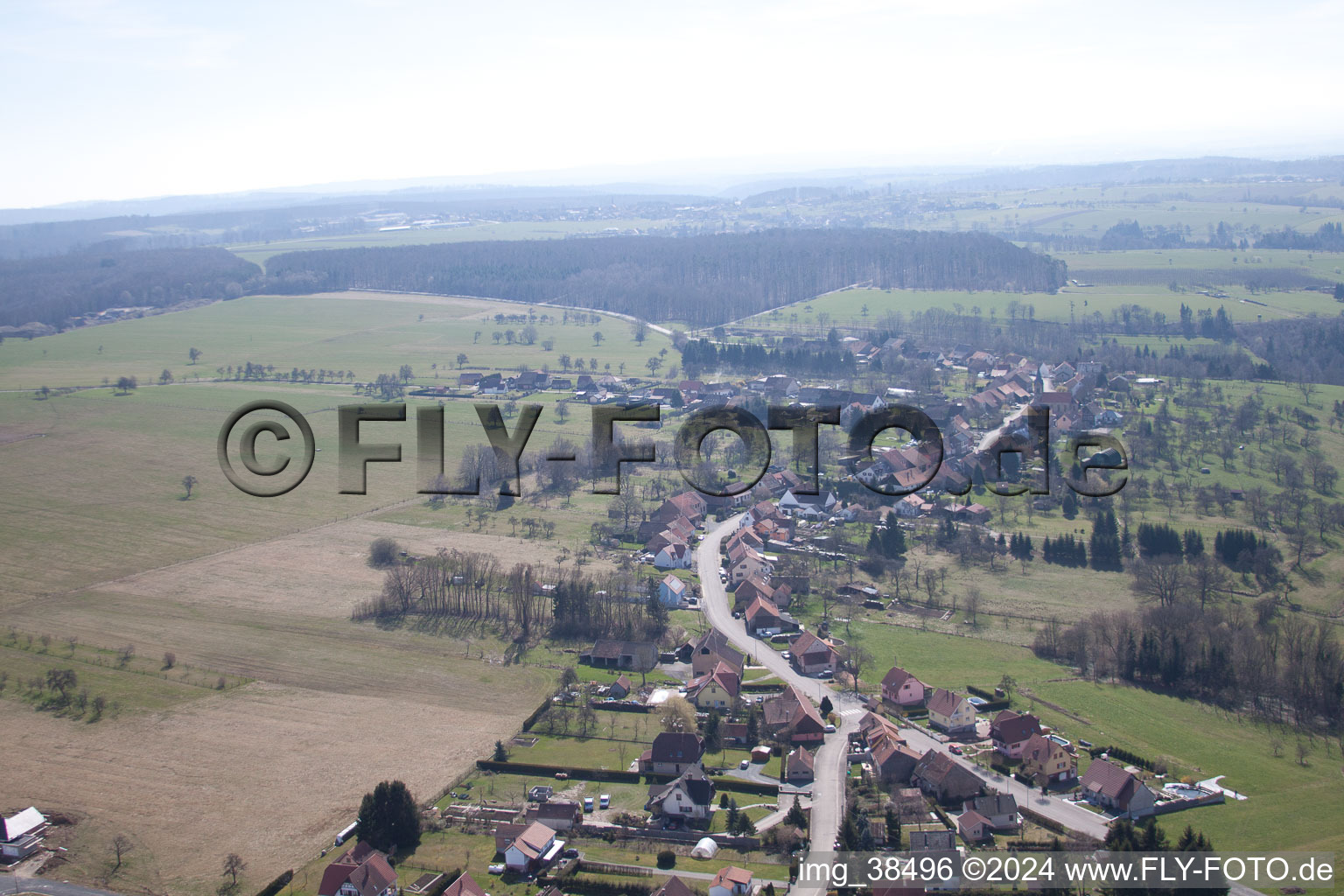 Aerial view of Village - view on the edge of agricultural fields and farmland in Struth in Grand Est, France