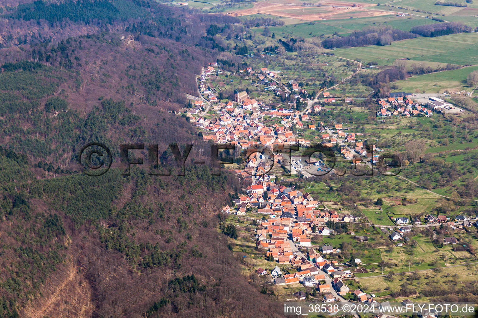 Aerial photograpy of Village - view on the edge of agricultural fields and farmland in Saint-Jean-Saverne in Grand Est, France