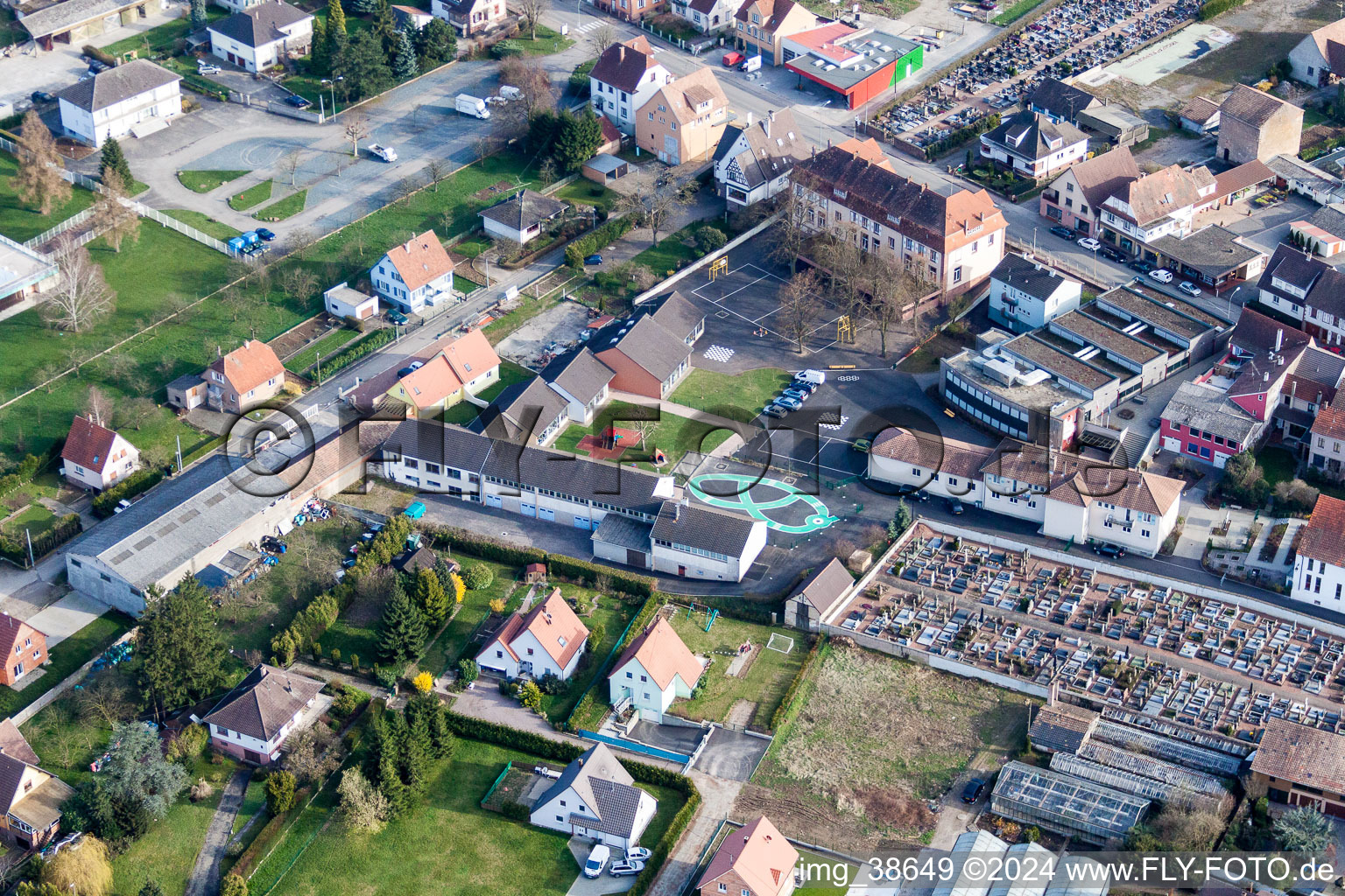 School building with painted court yard in Pfaffenhoffen in Grand Est, France