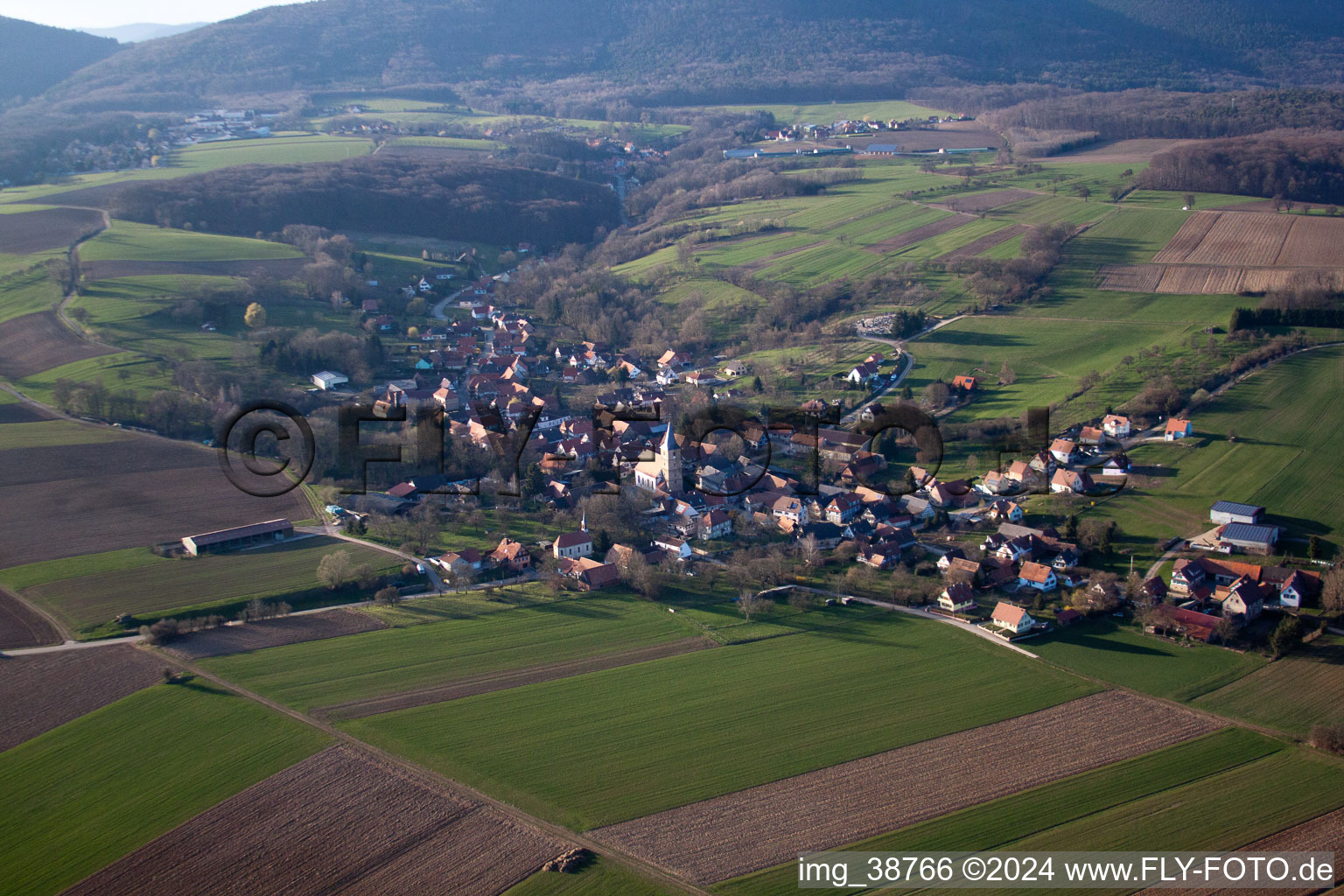 Village - view on the edge of agricultural fields and farmland in Drachenbronn-Birlenbach in Grand Est, France