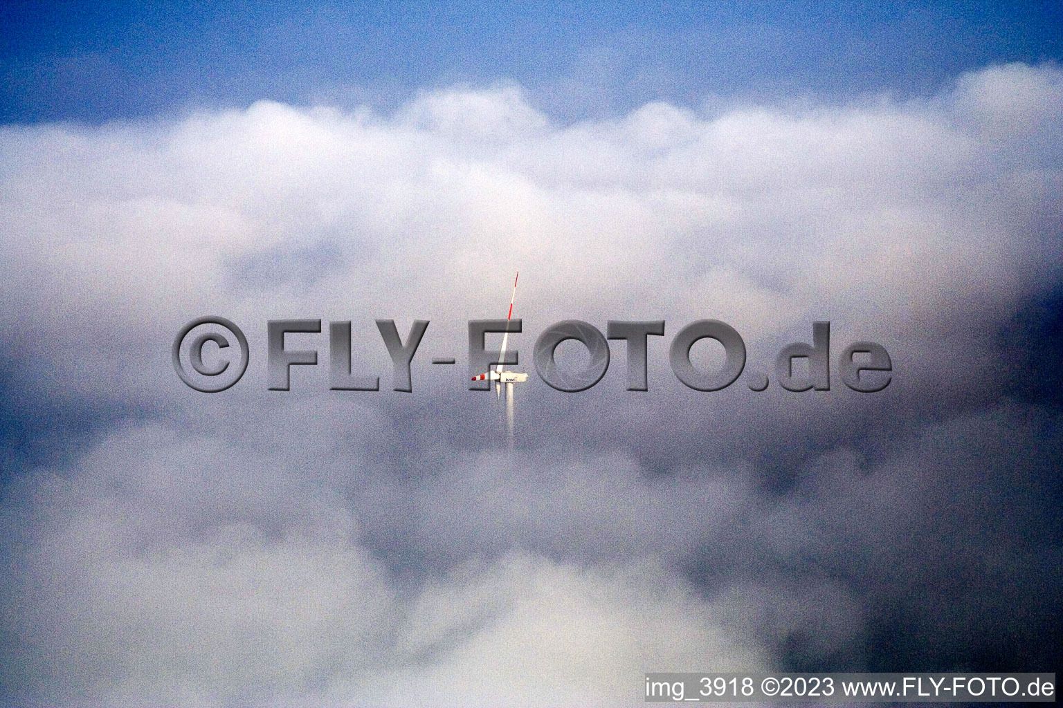 Wind turbines in clouds in Minfeld in the state Rhineland-Palatinate, Germany
