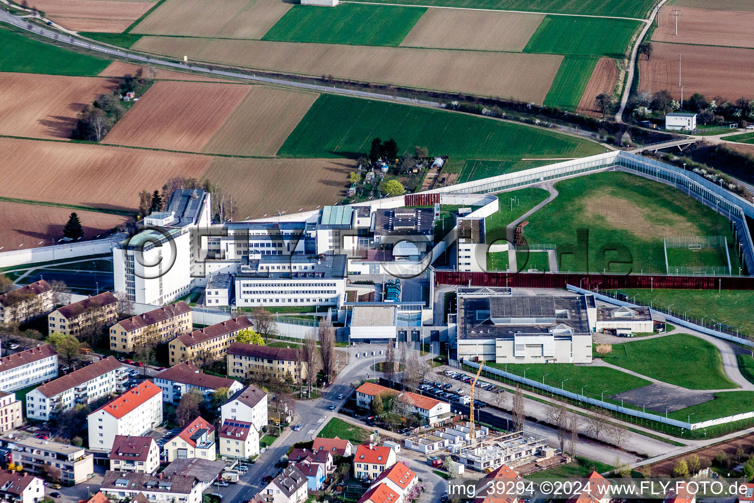 Prison grounds and high security fence Prison Justizvollzugsanstalt Stuttgart in Stammheim in the state Baden-Wurttemberg, Germany