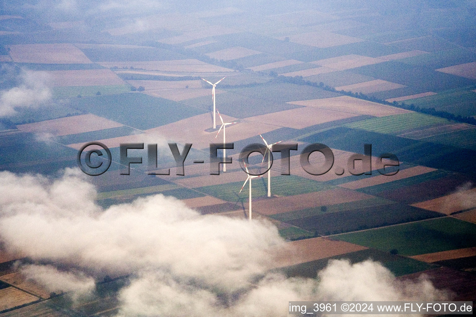 Aerial view of Wind turbines in clouds in Minfeld in the state Rhineland-Palatinate, Germany