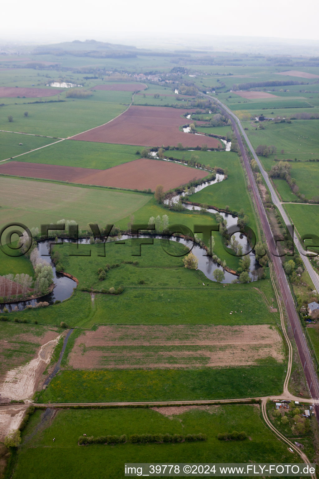 Curved loop of the riparian zones on the course of the river La Chiers in Carignan in Alsace-Champagne-Ardenne-Lorraine, France