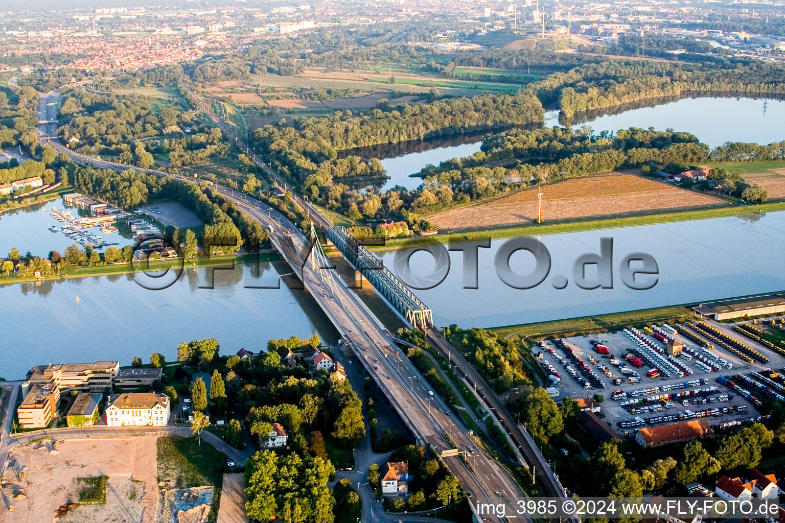 Oblique view of Rail and Street bridges construction across the Rhine river between Karlsruhe and Woerth am Rhein in the state Rhineland-Palatinate, Germany