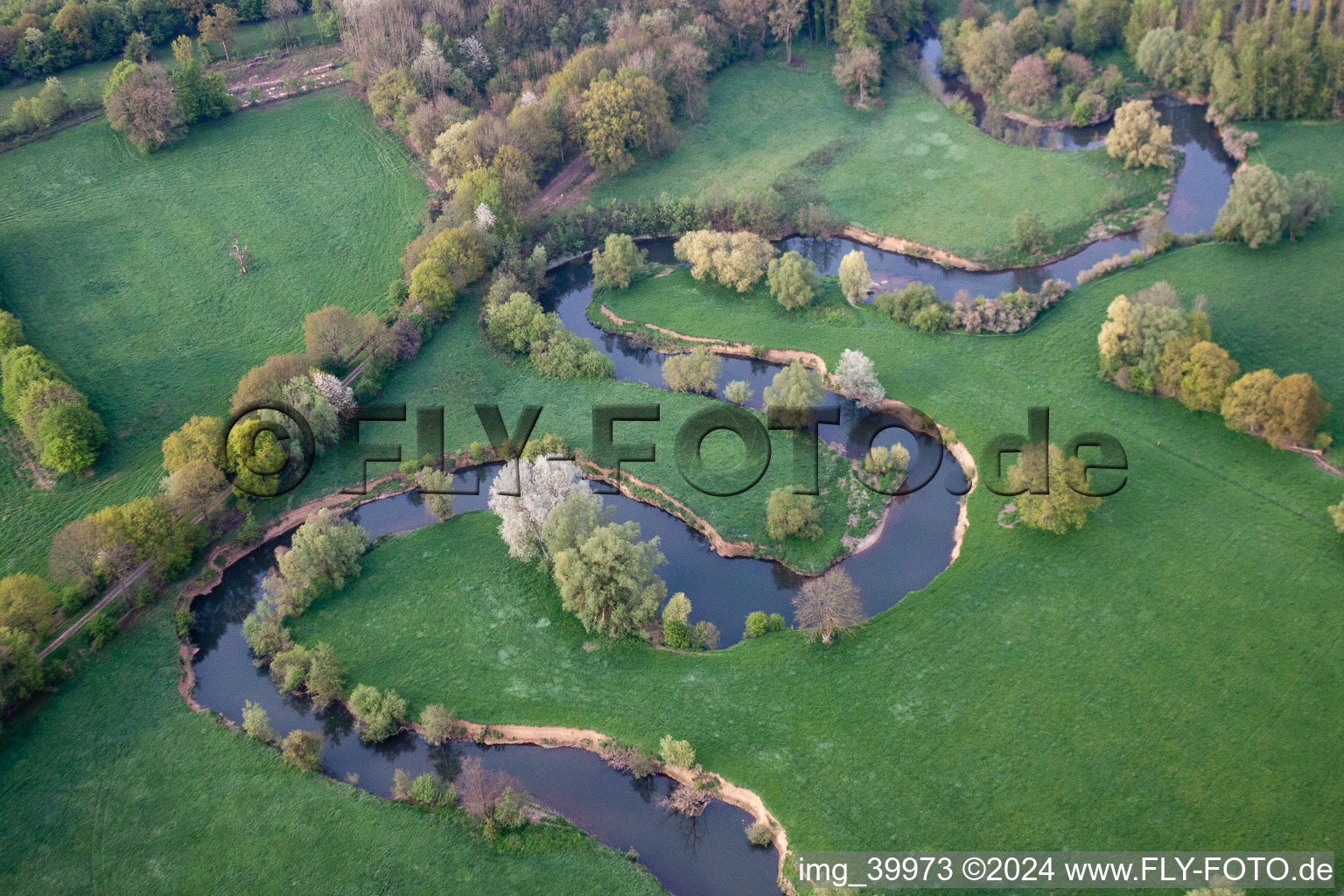 Curved loop of the riparian zones on the course of the river Oise in Chigny in Hauts-de-France, France