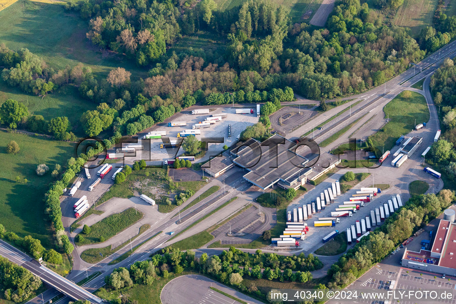 Lorries and Truck storage areas and free-standing storage on former customs Lauterbourg now state-police department Bienwald in Scheibenhard in Grand Est, France