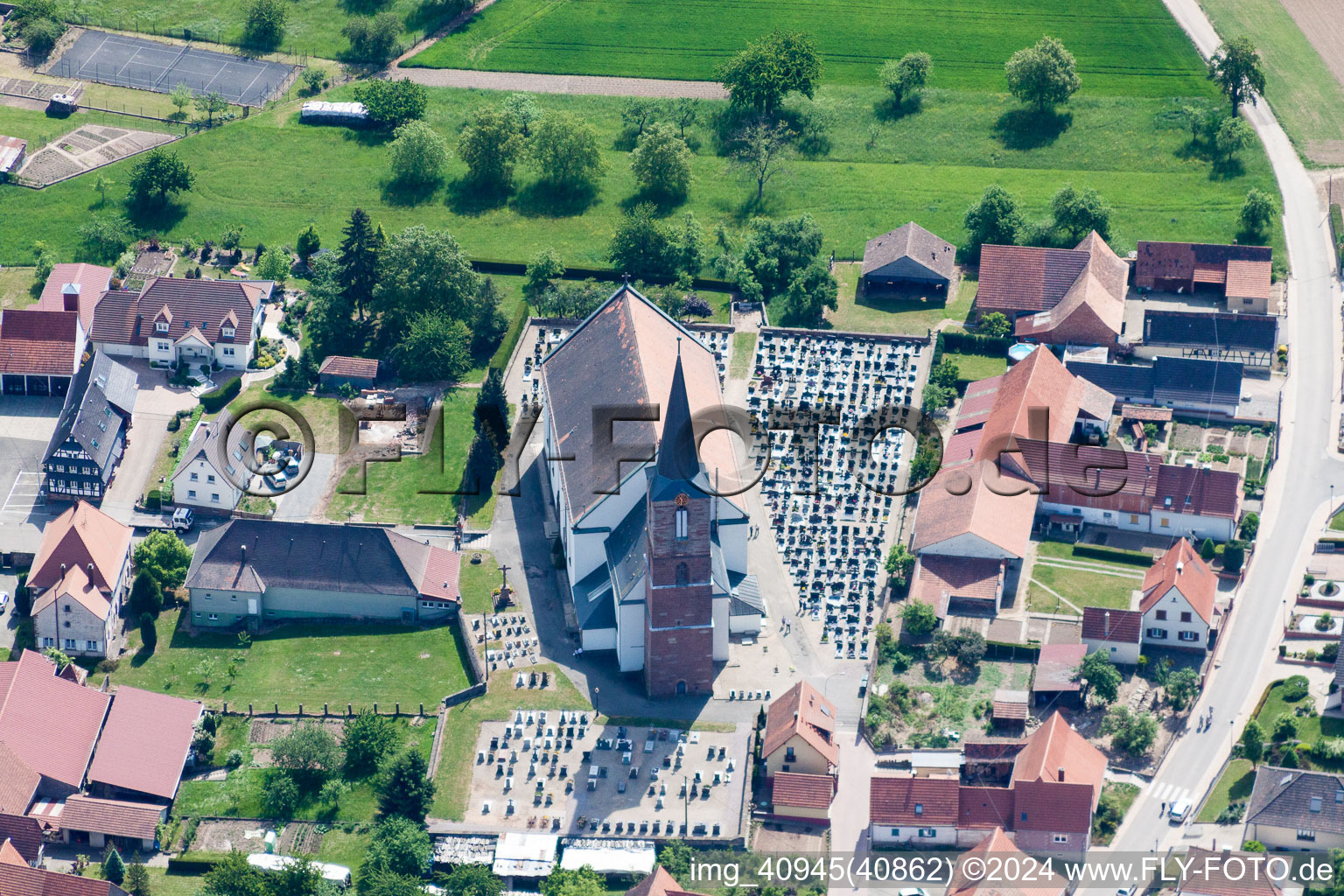 Aerial photograpy of Church building in the village of in Schleithal in Grand Est, France
