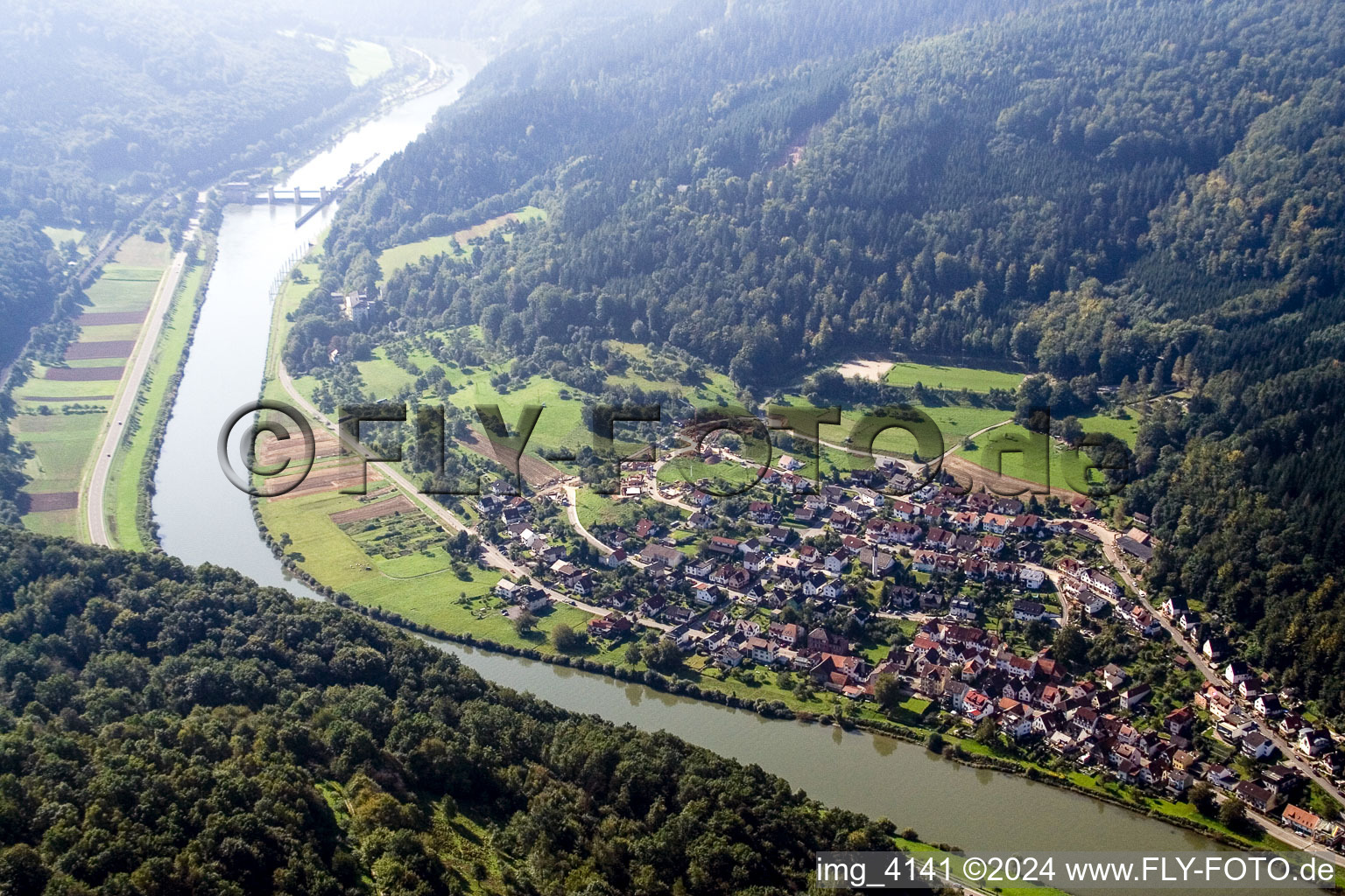 Aerial view of Village on the river bank areas of the river Neckar in the district Rockenau in Eberbach in the state Baden-Wurttemberg