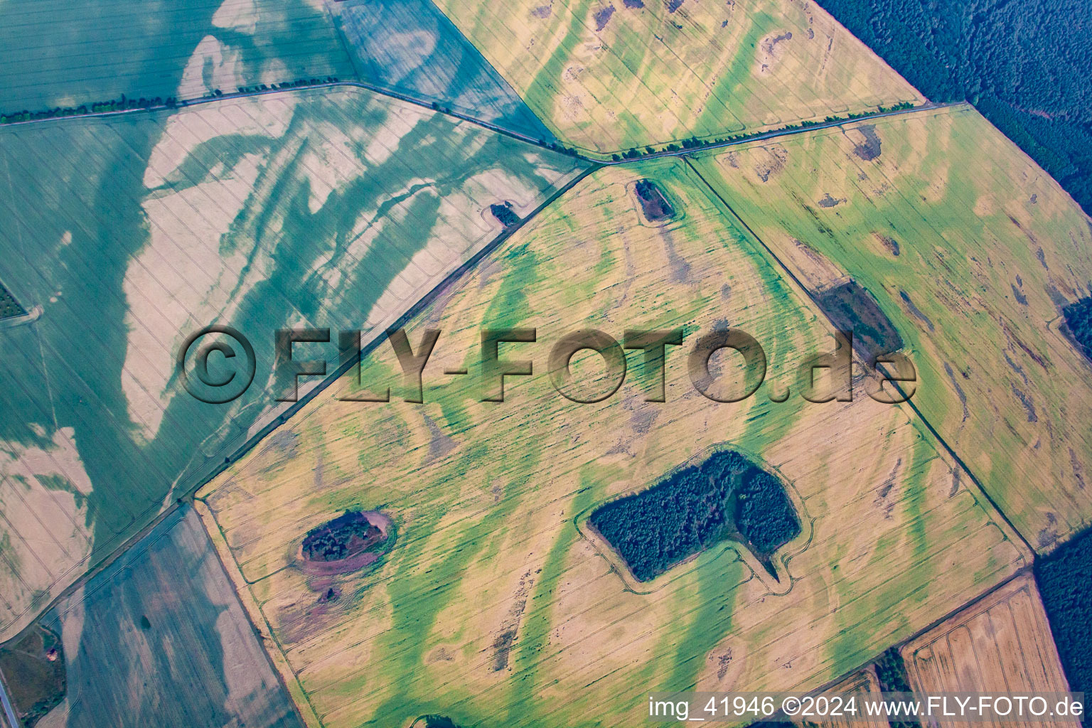 Agricultural fields embossed of soil erosion and water structures in Thale in the state Saxony-Anhalt