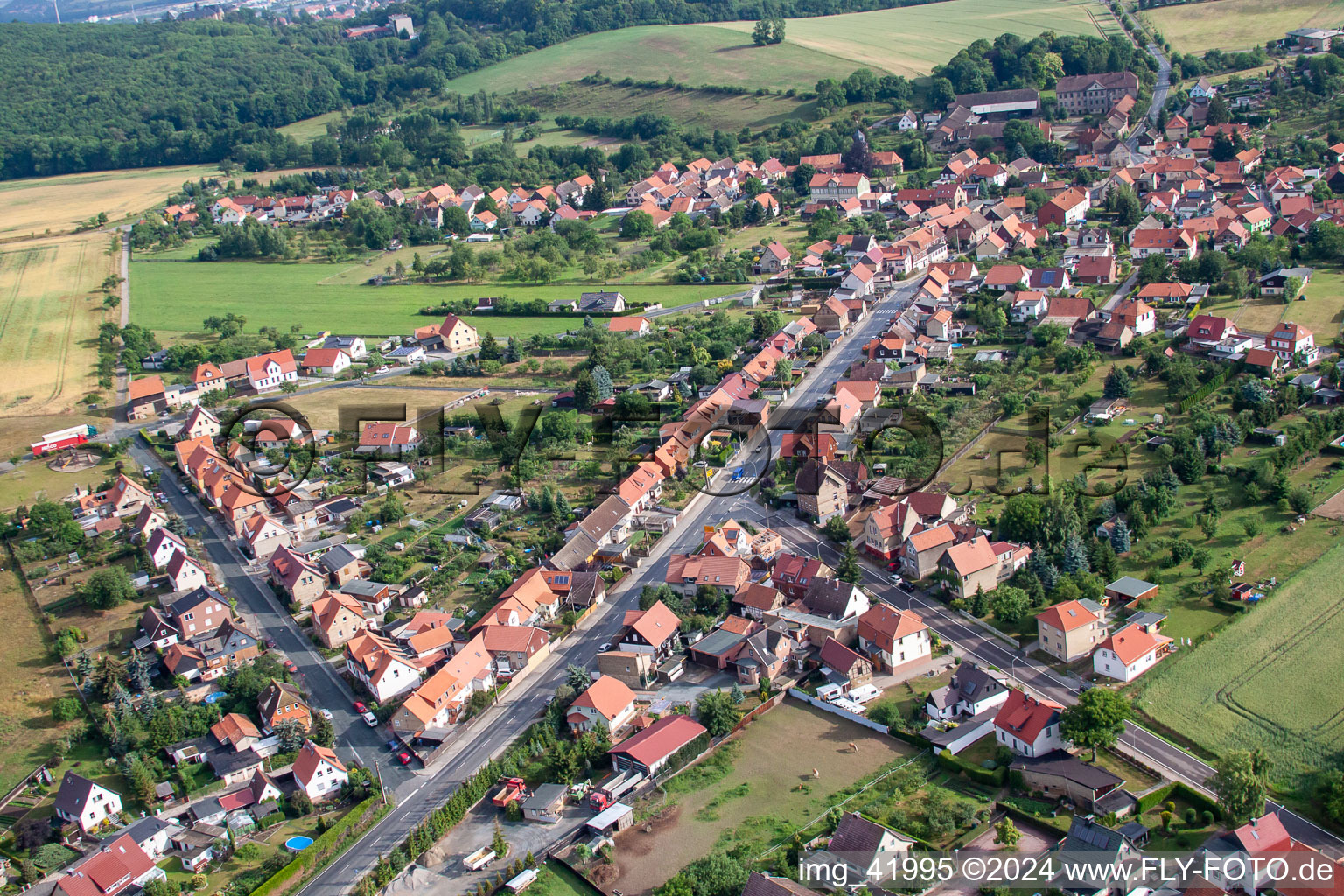 Village - view on the edge of agricultural fields and farmland in Cattenstedt in the state Saxony-Anhalt, Germany