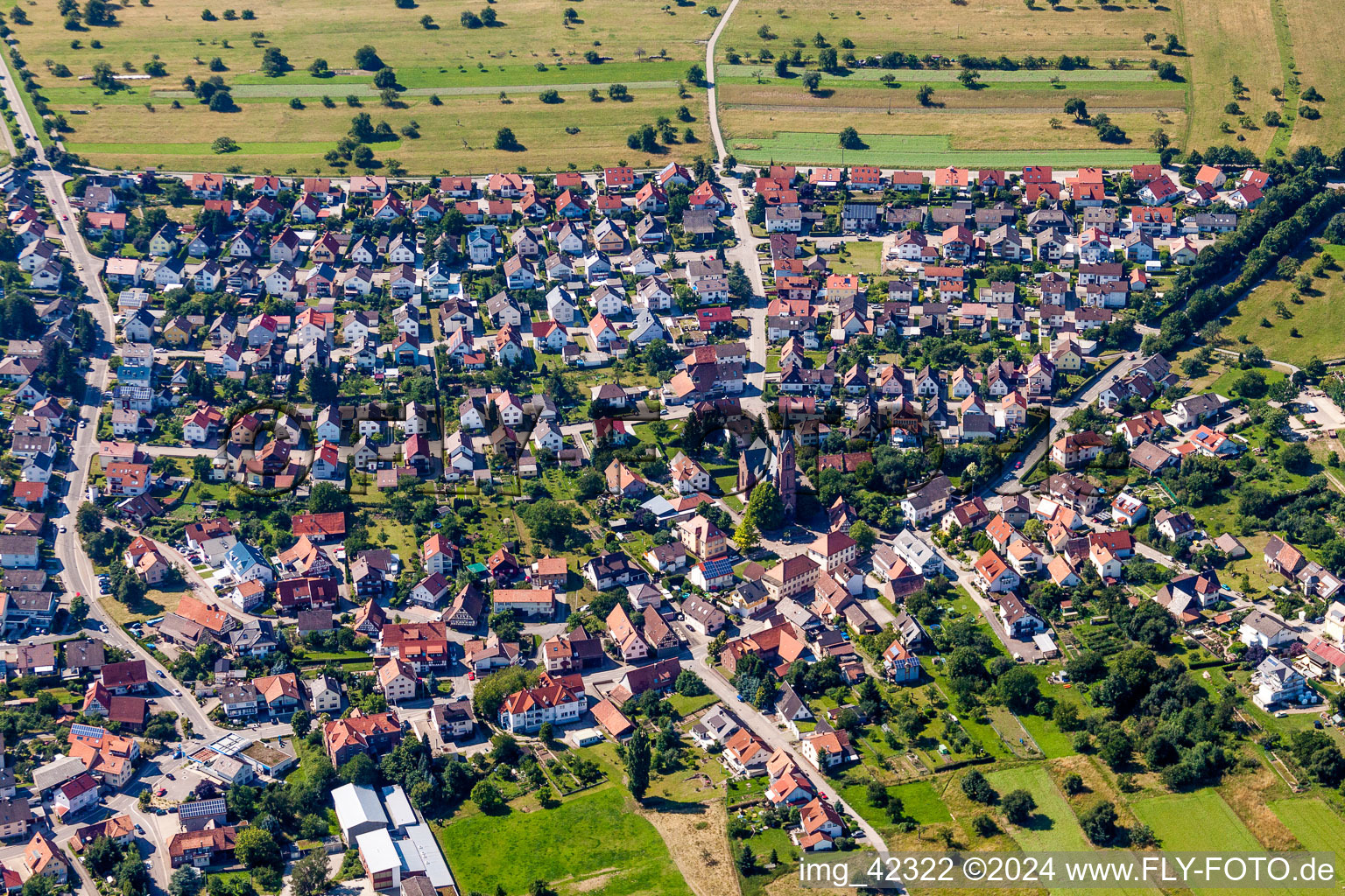 Village - view on the edge of agricultural fields and farmland in Schoellbronn in the state Baden-Wurttemberg, Germany