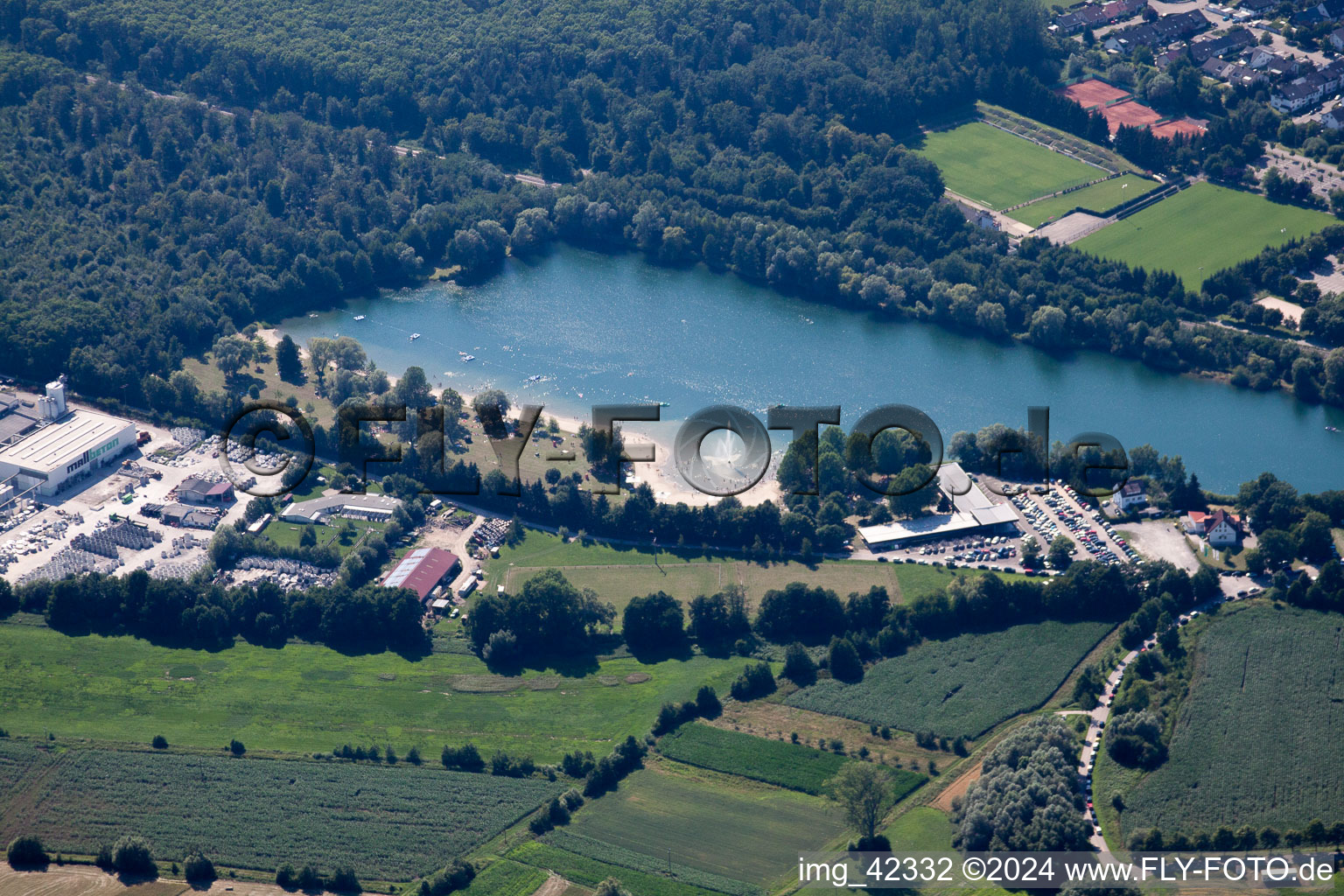 Beach and the shore areas of the lake Badesee Buchtzig in Ettlingen in the state Baden-Wurttemberg