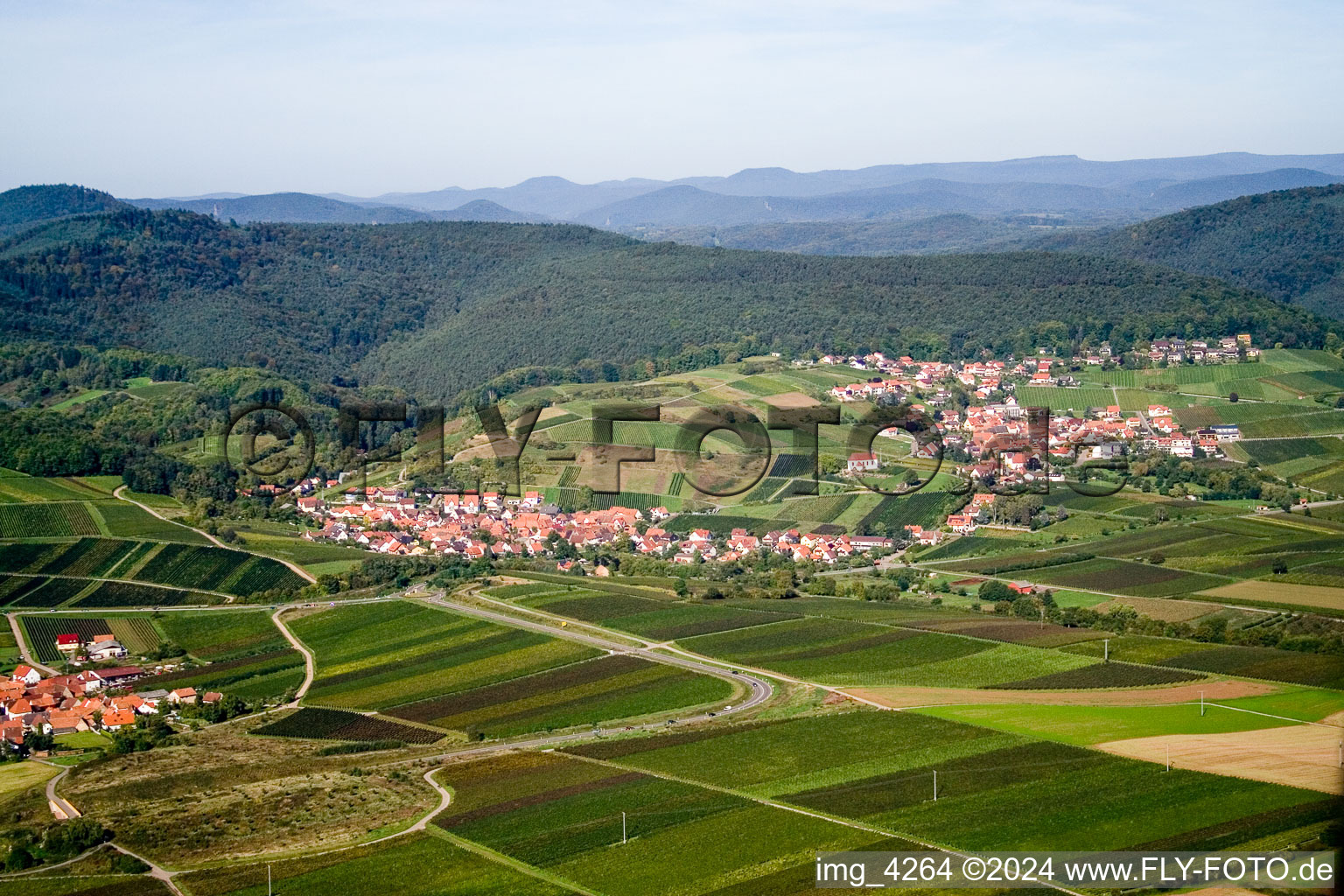 Aerial photograpy of Village - view on the edge of agricultural fields and farmland in Gleiszellen-Gleishorbach in the state Rhineland-Palatinate