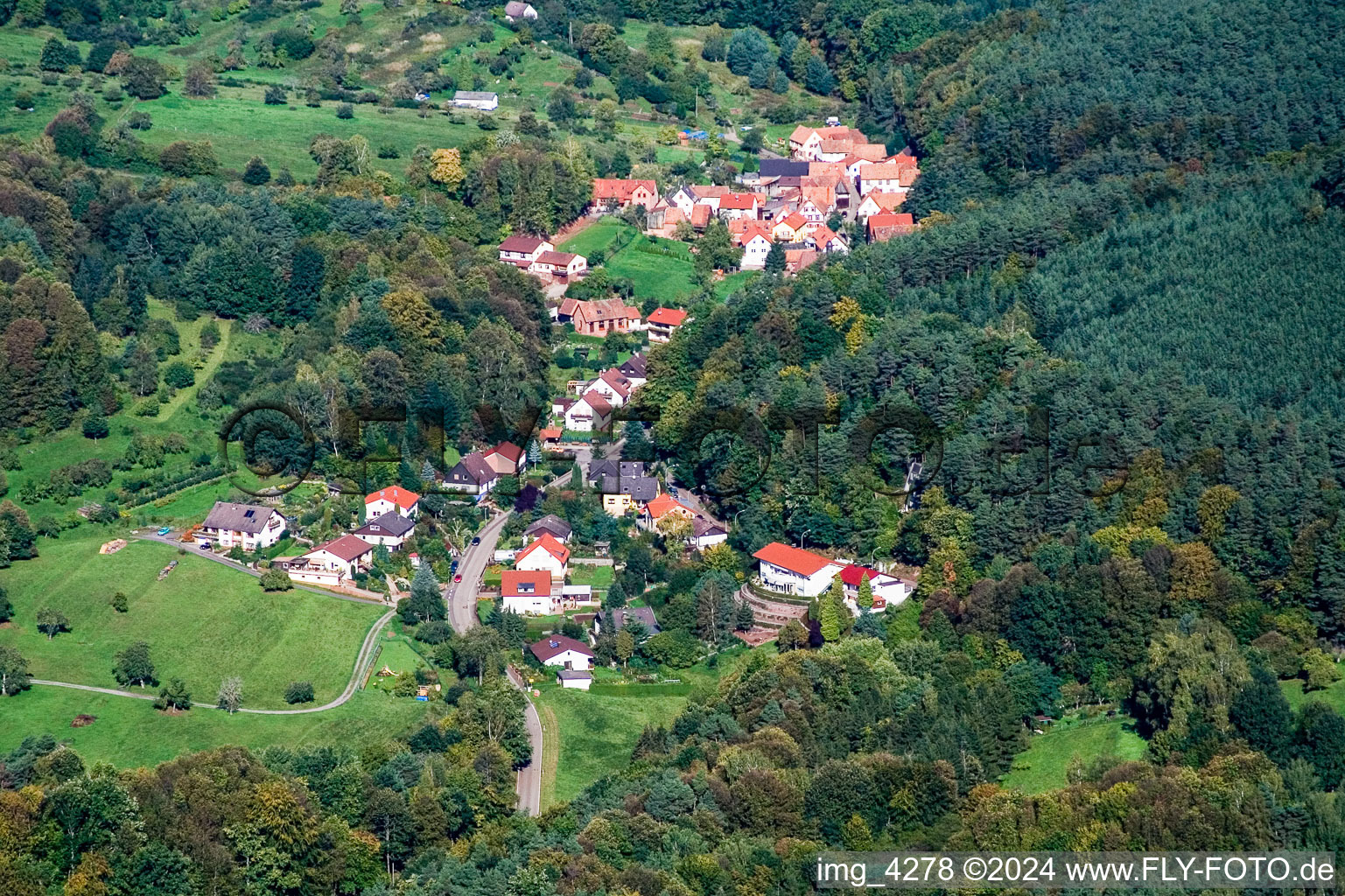 Village - view on the edge of agricultural fields and farmland in the district Blankenborn in Bad Bergzabern in the state Rhineland-Palatinate