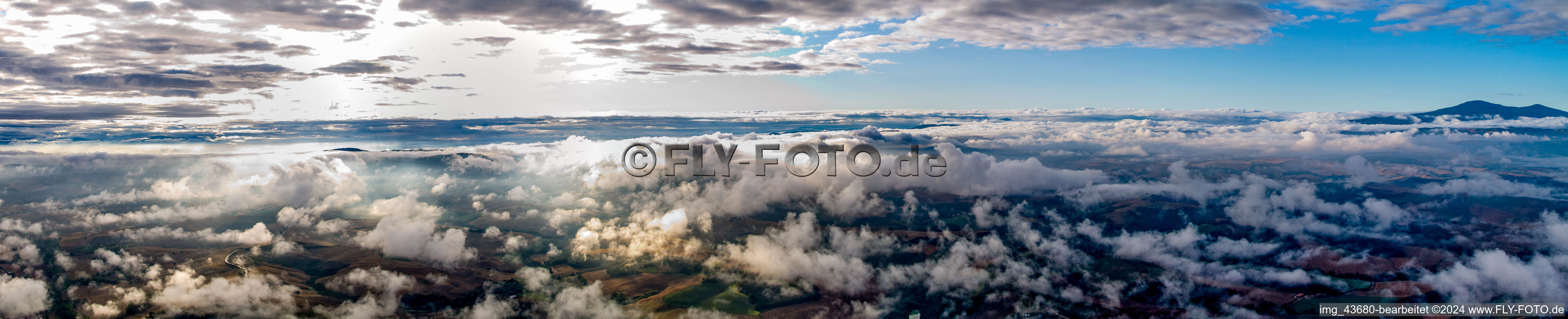 Panoramic perspective of Rocky and mountainous landscape with clouds in Montepulciano in Toskana, Italy