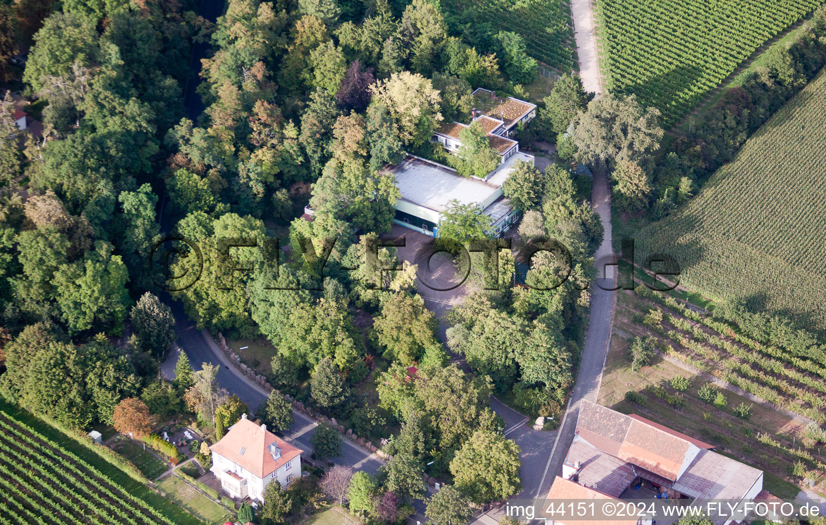 Company premises of SEKA Schutzbelüftung GmbH with halls, company buildings and production facilities in the district Wollmesheim in Landau in der Pfalz in the state Rhineland-Palatinate, Germany from the plane