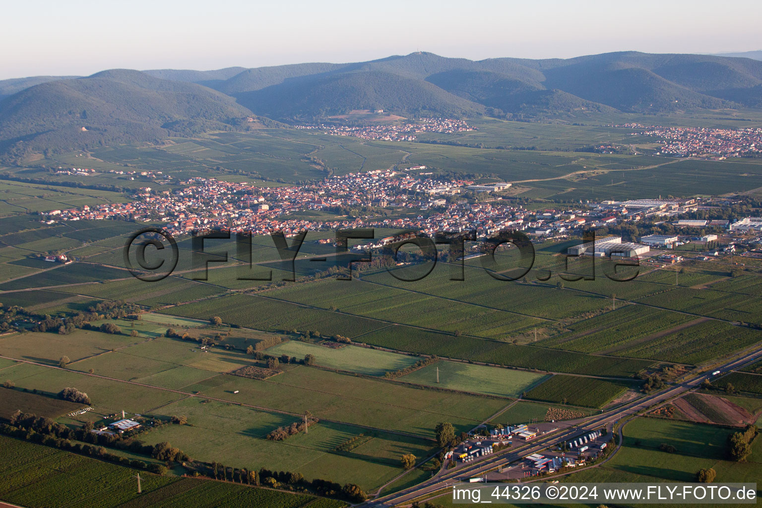 Aerial view of Village - view on the edge of agricultural fields and farmland in Edenkoben in the state Rhineland-Palatinate