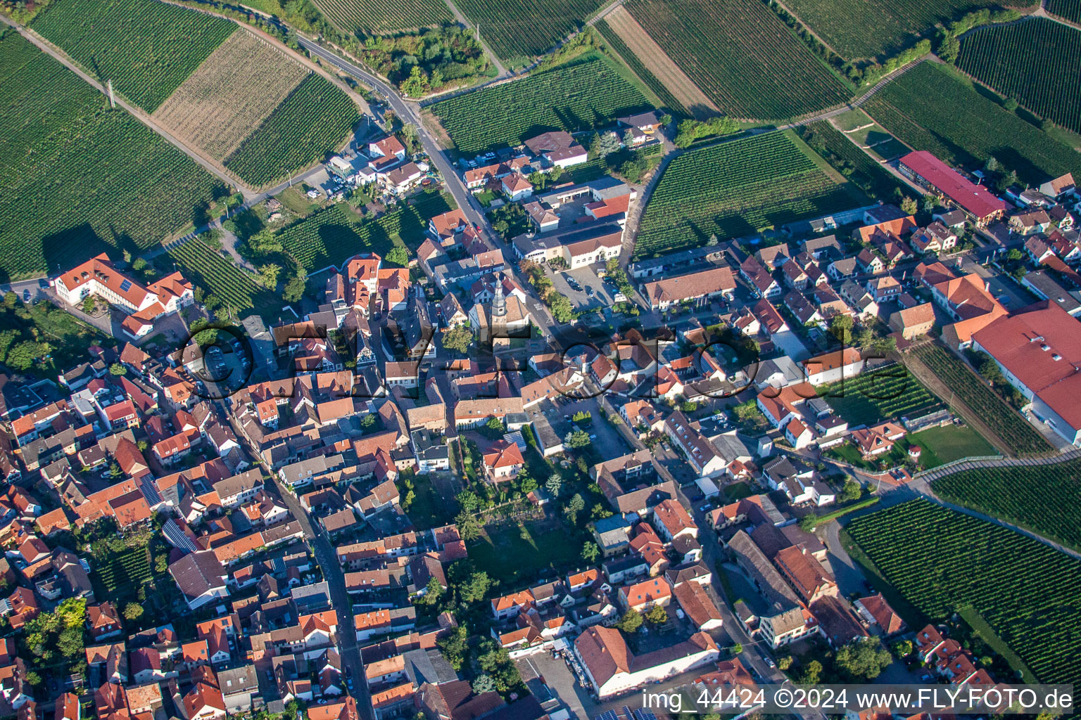 Aerial view of Village - view on the edge of agricultural fields and farmland in Kallstadt in the state Rhineland-Palatinate, Germany