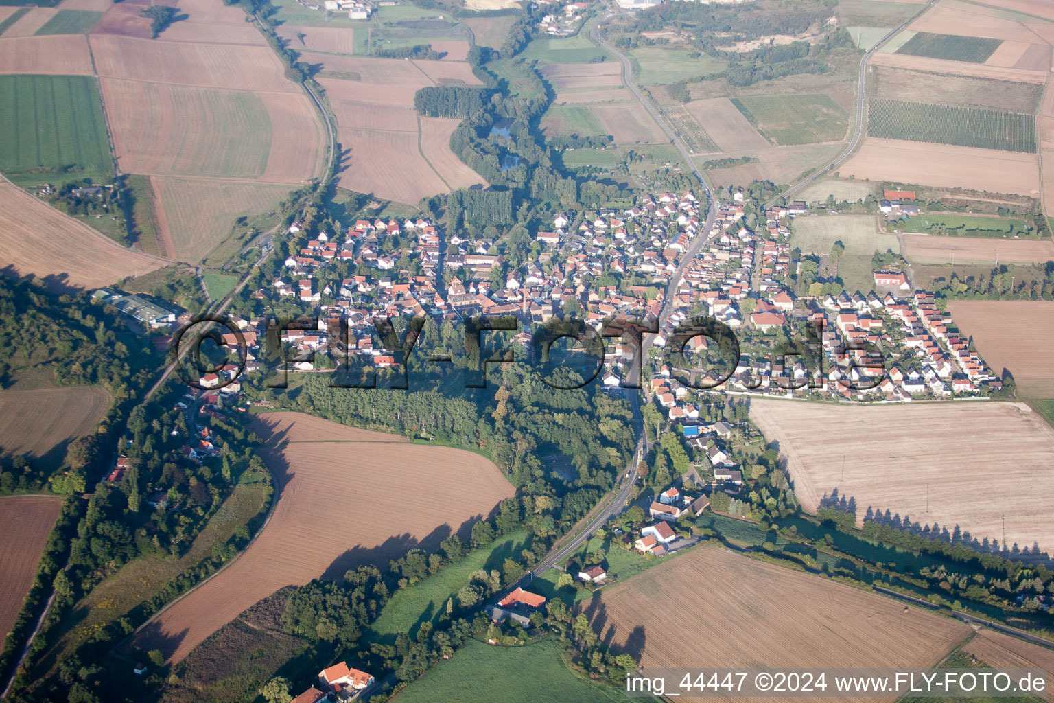 Aerial view of Village - view on the edge of agricultural fields and farmland in Ebertsheim in the state Rhineland-Palatinate