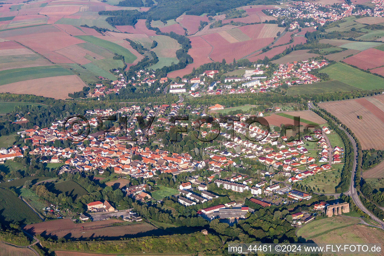 Village - view on the edge of agricultural fields and farmland in Marnheim in the state Rhineland-Palatinate, Germany