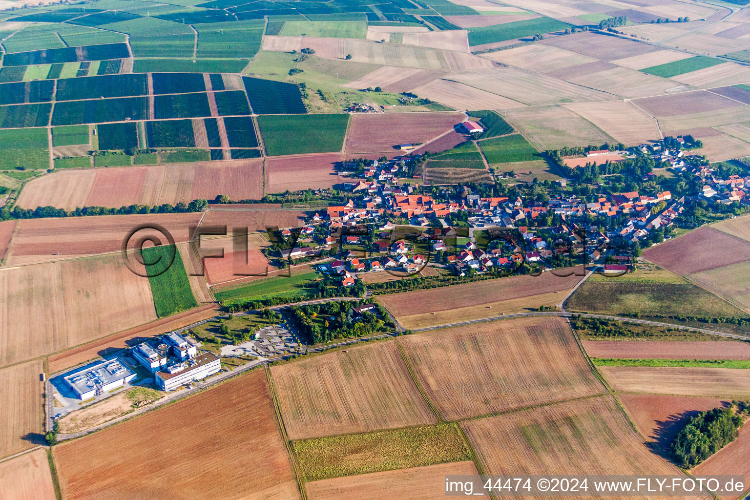 Village - view on the edge of agricultural fields and farmland in Wendelsheim in the state Rhineland-Palatinate, Germany