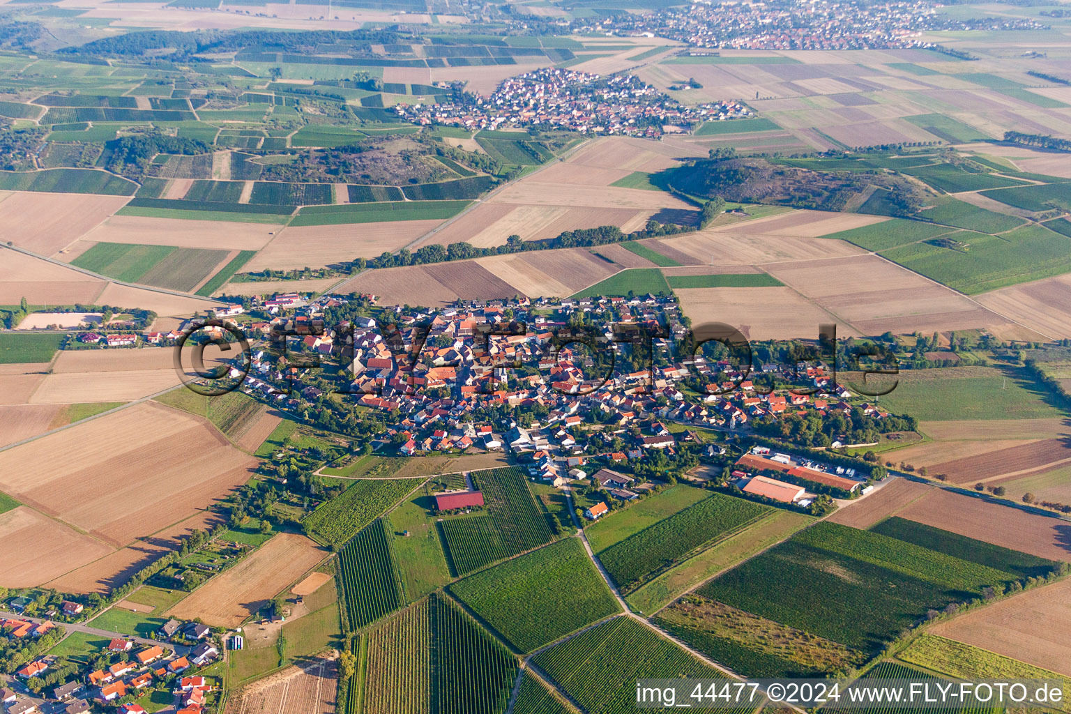 Village - view on the edge of agricultural fields and farmland in Wonsheim in the state Rhineland-Palatinate, Germany