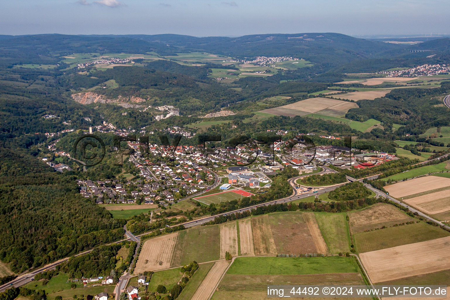 Village - view on the edge of agricultural fields and farmland in Stromberg in the state Rhineland-Palatinate, Germany