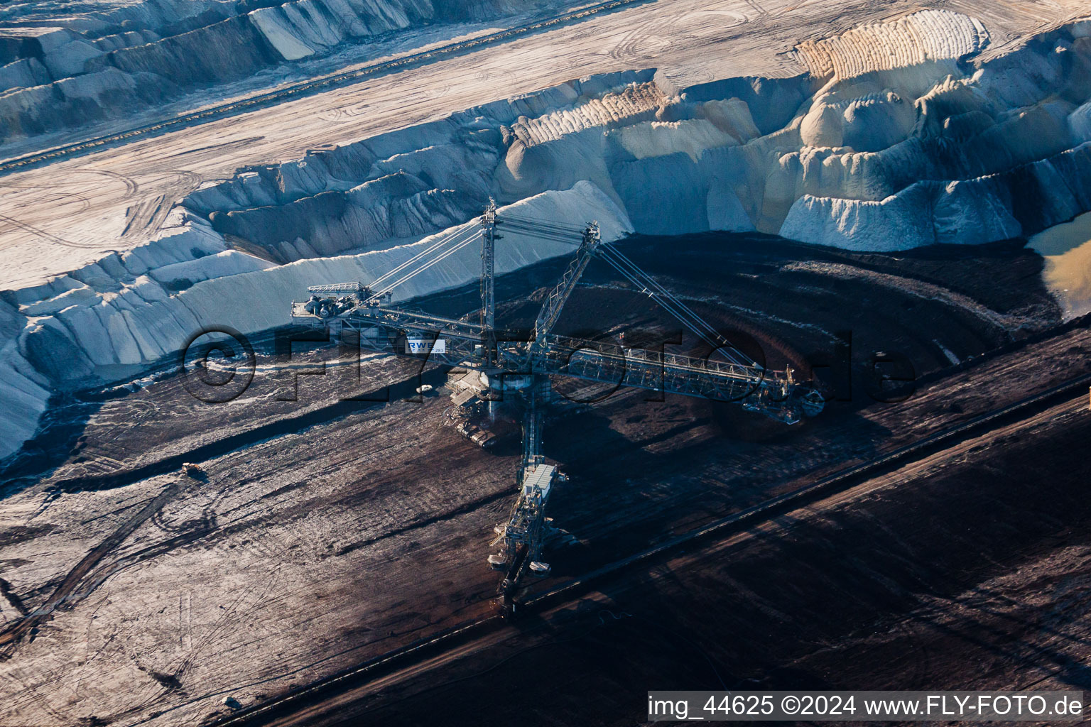 Dredging conveyor bridge in brown coal mine in Inden in the state North Rhine-Westphalia from above