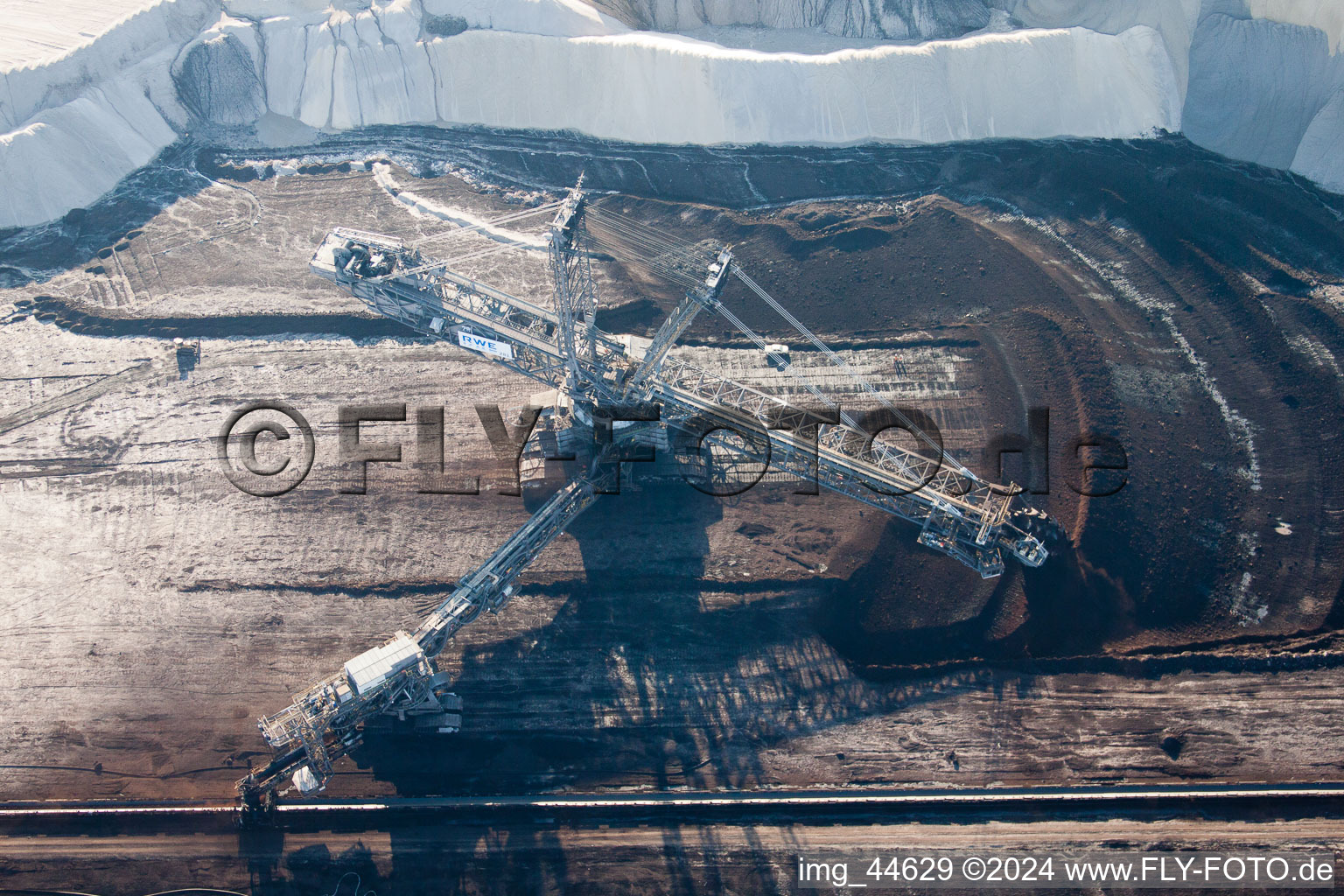 Open-cast lignite mining in Inden in the state North Rhine-Westphalia, Germany seen from a drone