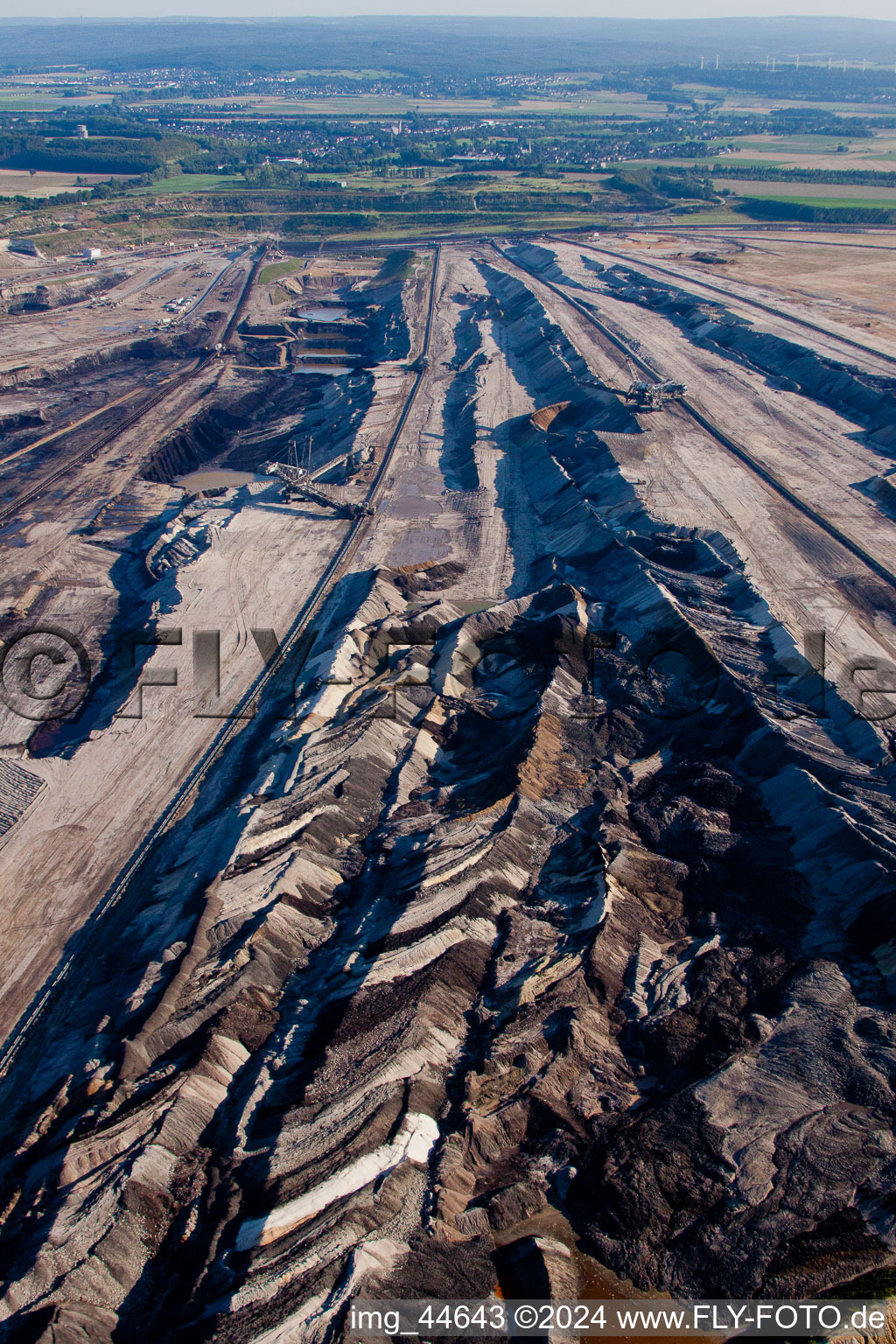 Dredging conveyor bridge in brown coal mine in Inden in the state North Rhine-Westphalia seen from above