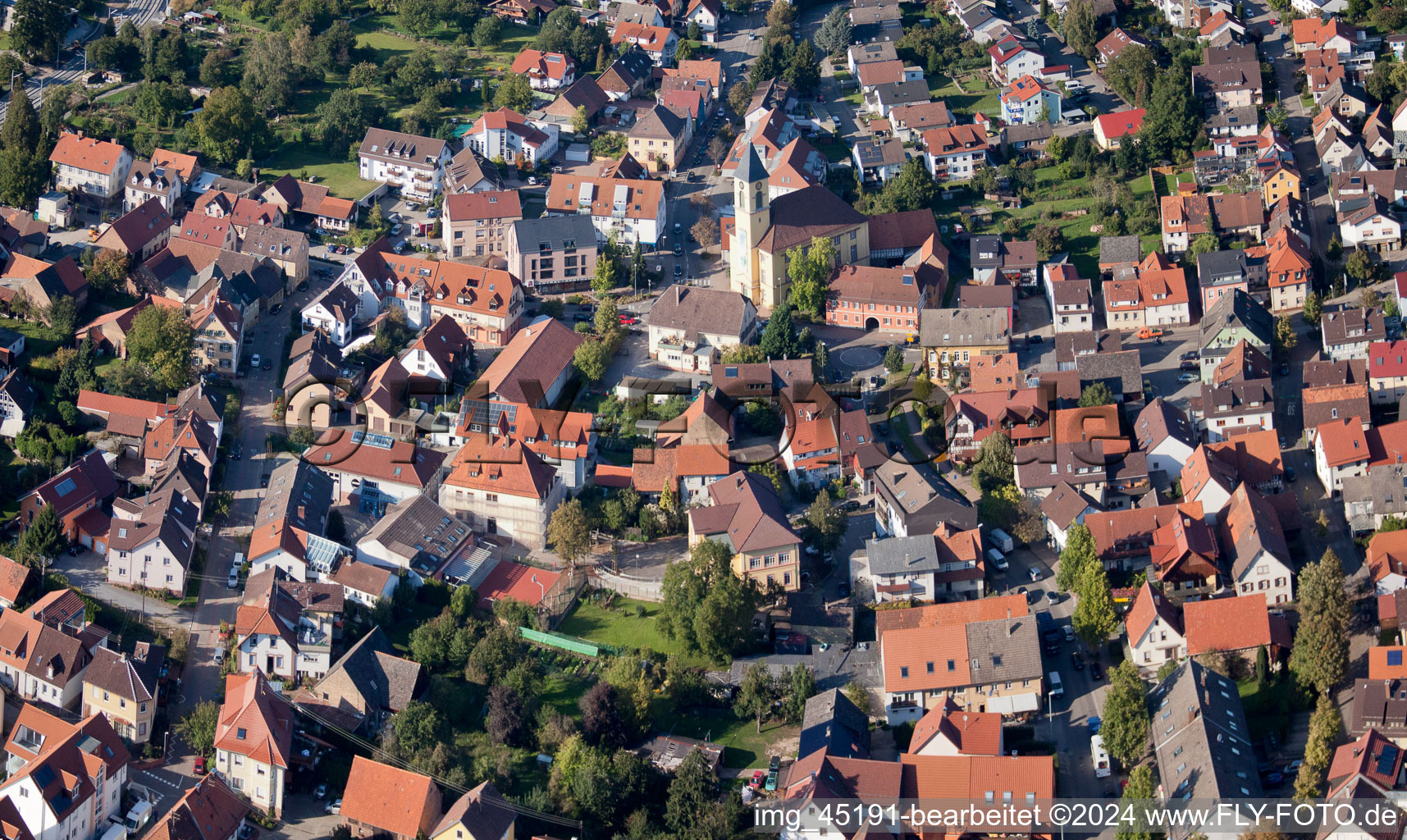 Main Street in the district Langensteinbach in Karlsbad in the state Baden-Wuerttemberg, Germany from a drone