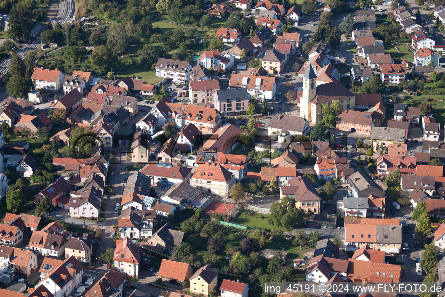 Main Street in the district Langensteinbach in Karlsbad in the state Baden-Wuerttemberg, Germany seen from a drone