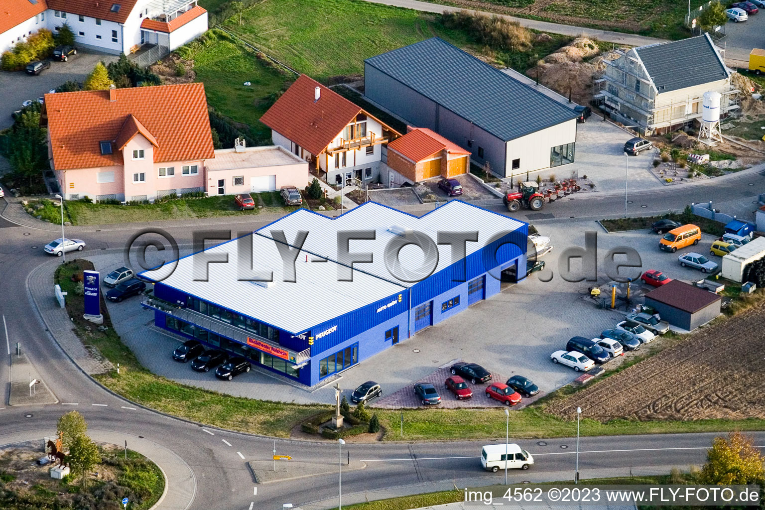 Oblique view of Nordring, Peugeot Autohaus Grün in Rülzheim in the state Rhineland-Palatinate, Germany