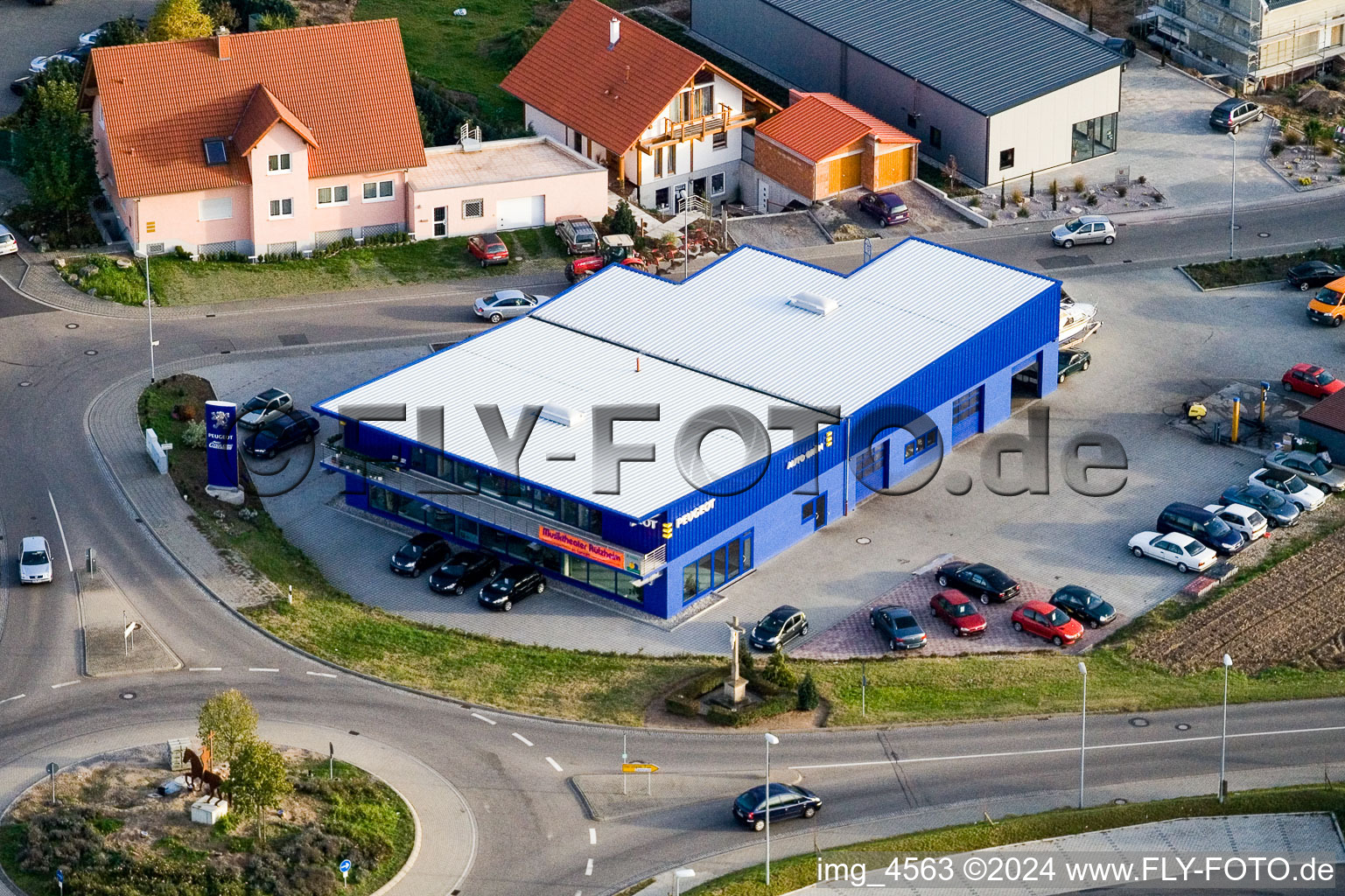 Nordring, Peugeot dealership Grün in Rülzheim in the state Rhineland-Palatinate, Germany from above