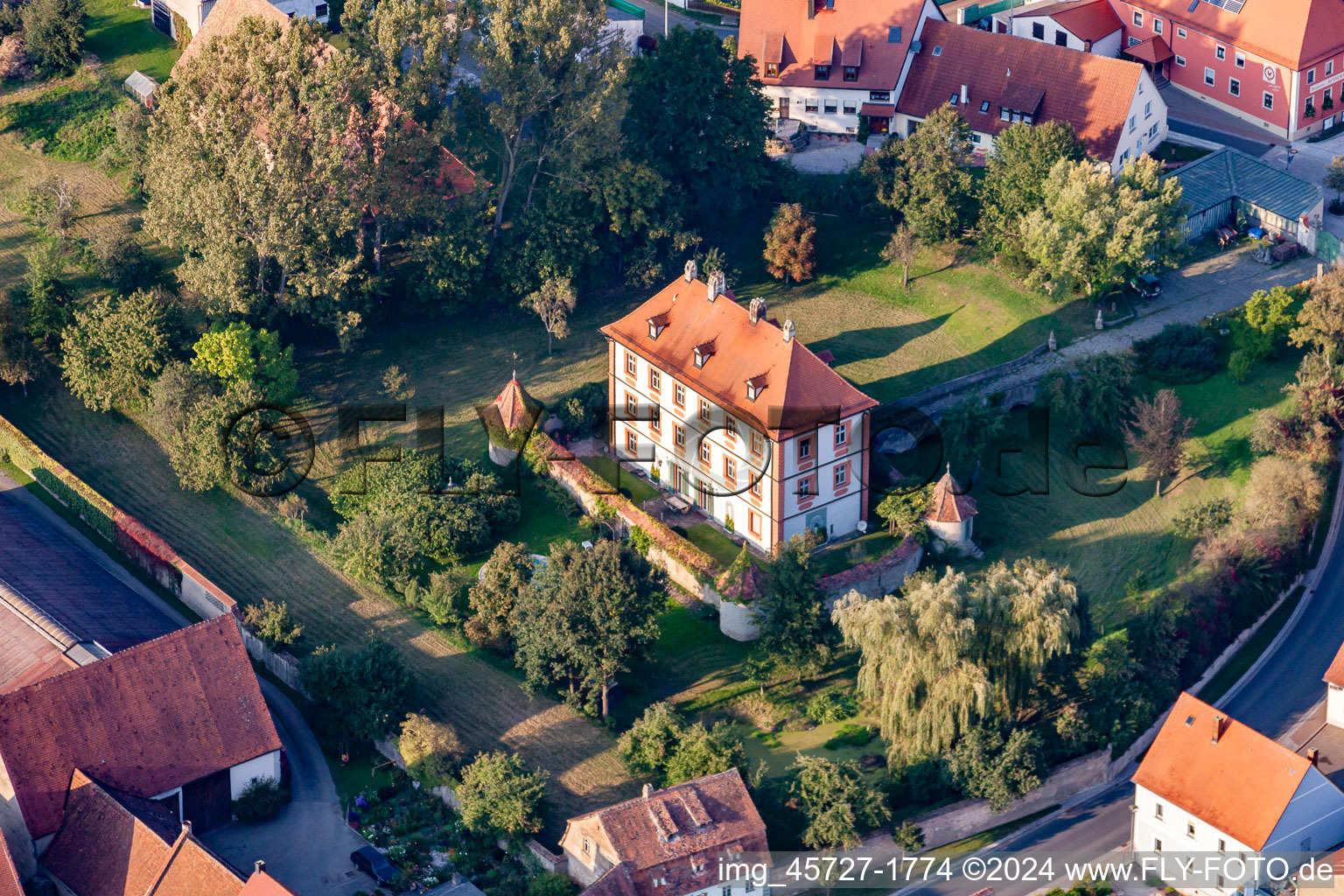 Aerial photograpy of Buildings and parks at the mansion of the farmhouse in Sambach in the state Bavaria, Germany