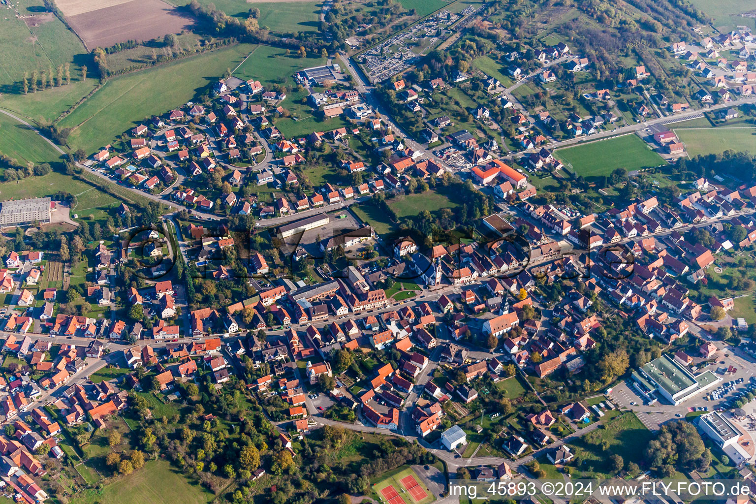 Town View of the streets and houses of the residential areas in Soultz-sous-Forets in Grand Est, France seen from above