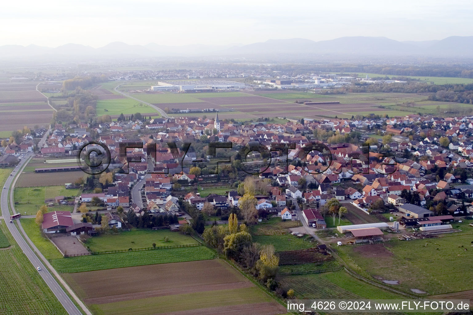 Oblique view of Village - view on the edge of agricultural fields and farmland in Ottersheim bei Landau in the state Rhineland-Palatinate