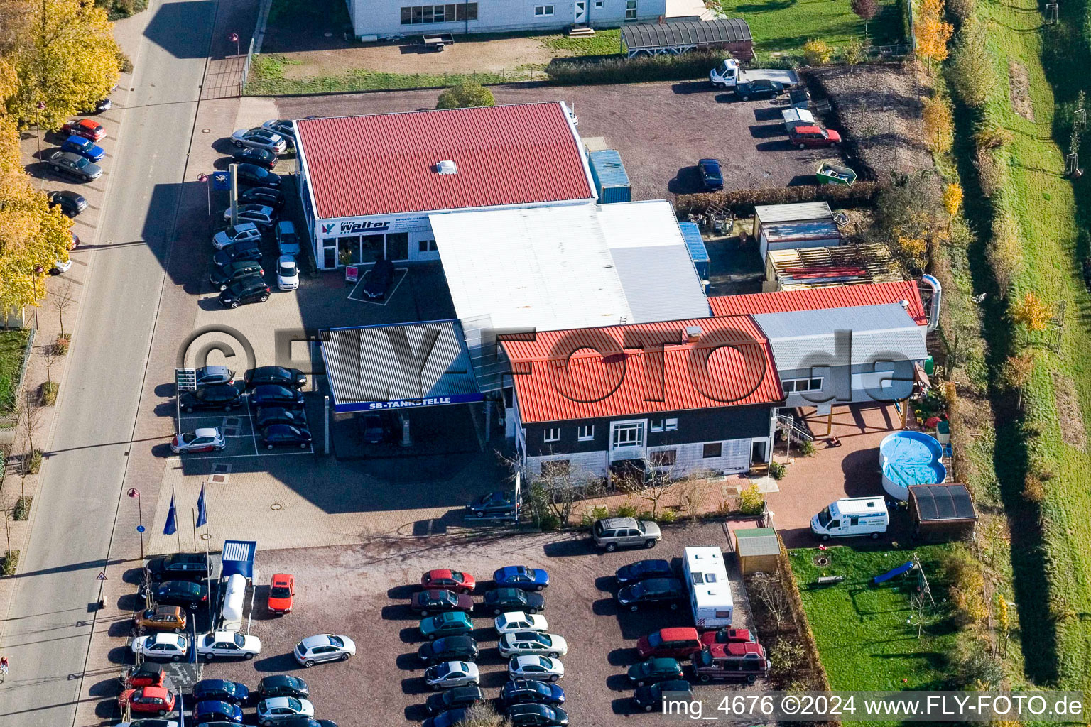 Aerial view of Main Street Car Dealership Walter in Steinweiler in the state Rhineland-Palatinate, Germany