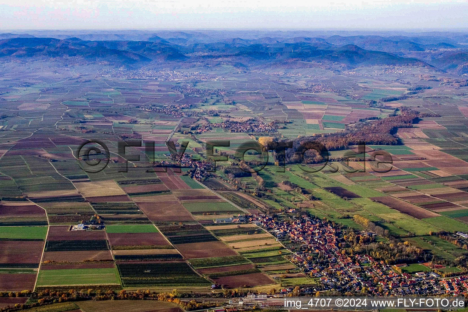 Village view of Winden in front of the hills of palatinate in the state Rhineland-Palatinate