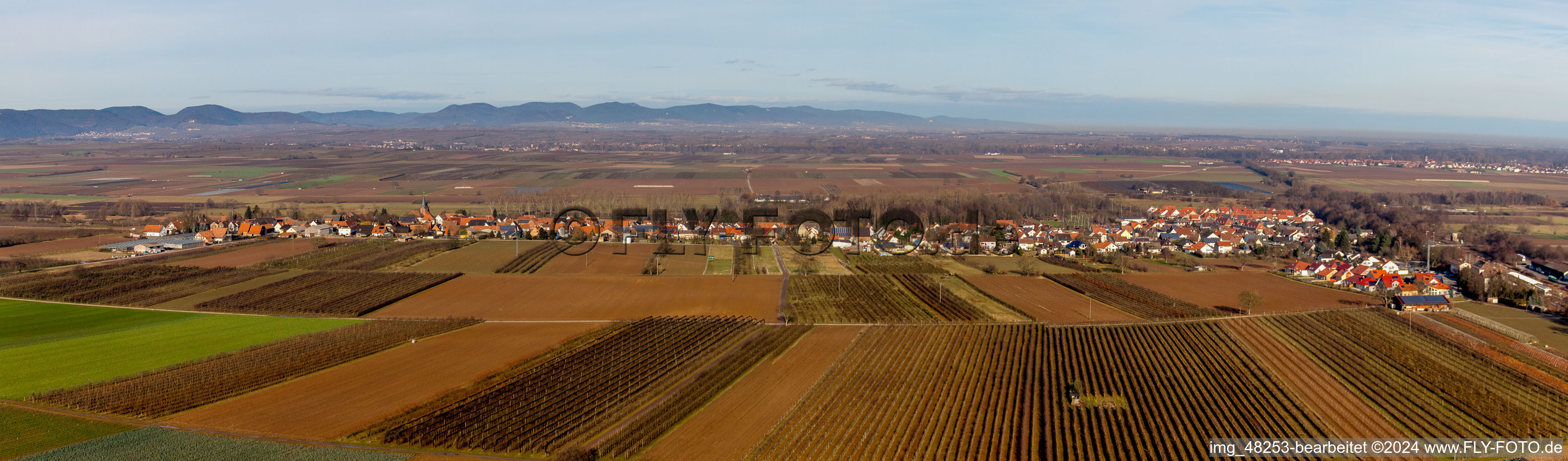 Panoramic perspective Village - view on the edge of agricultural fields and farmland in Winden in the state Rhineland-Palatinate, Germany